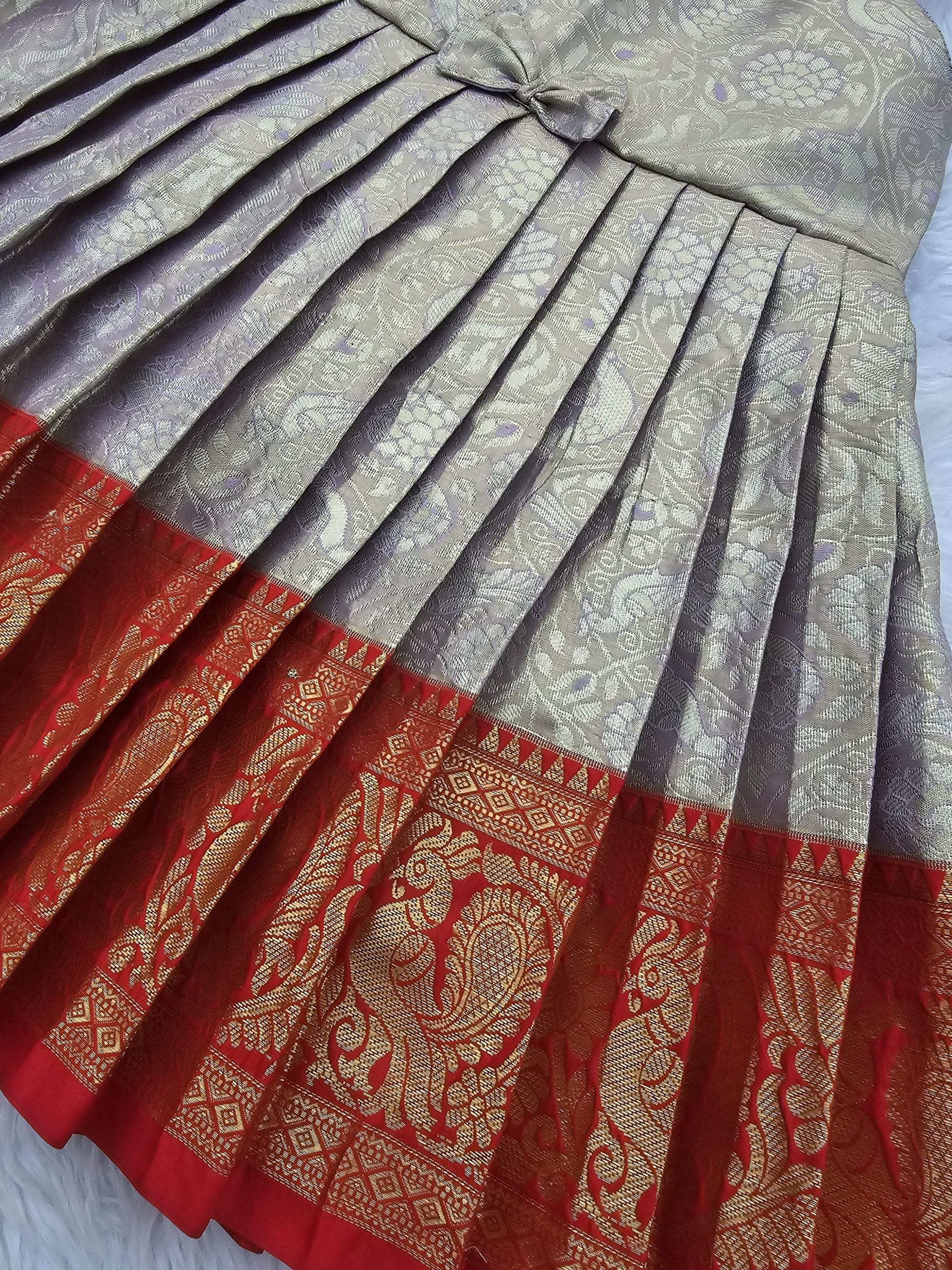 SWAYAM KIDS FROCK-PASTEL LILAC WITH RED ANNAPAKSHI SMALL BORDER