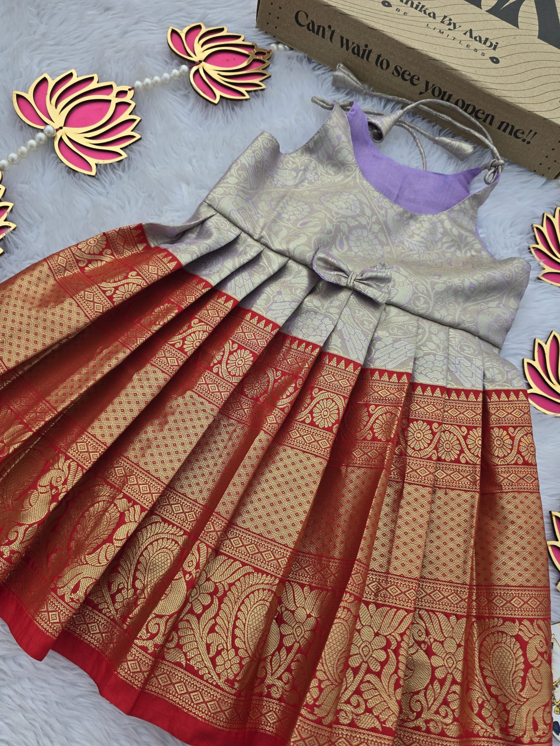 SWAYAM KIDS FROCK-PASTEL LILAC WITH RED ANNAPAKSHI BIG BORDER