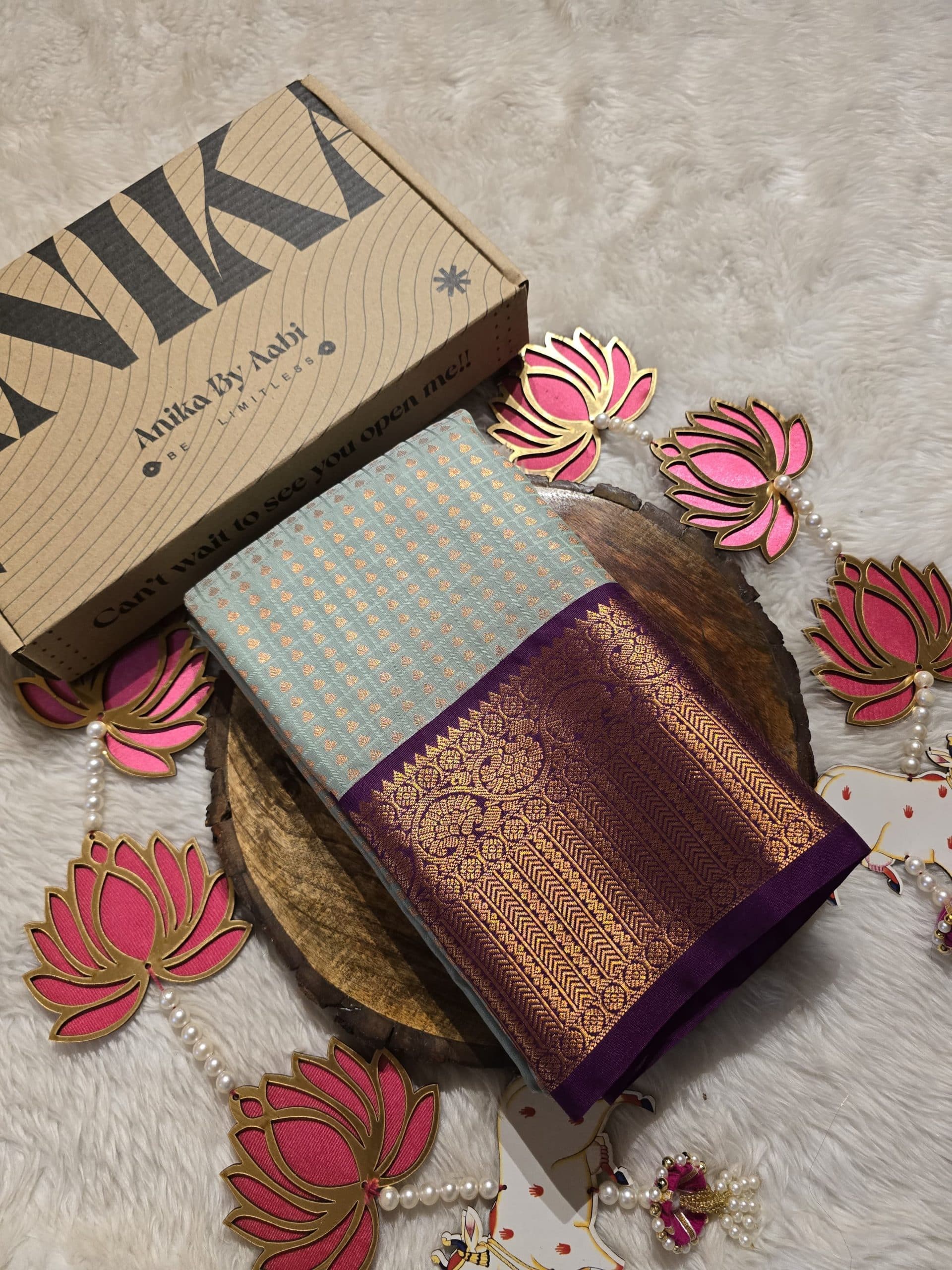 1000 BUTTAS-PASTEL ICEBLUE WITH DARK MAGENTA