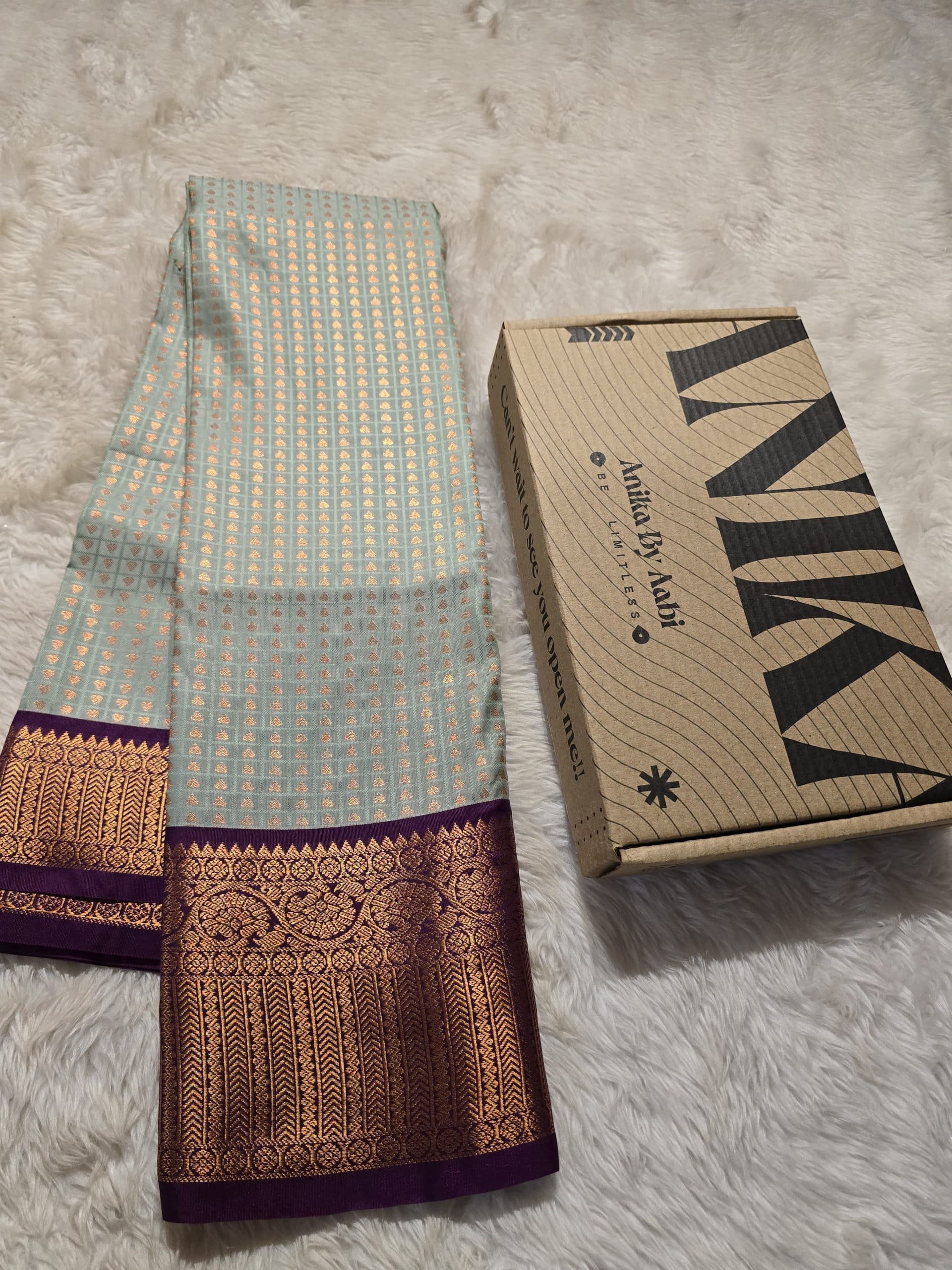 1000 BUTTAS-PASTEL ICEBLUE WITH DARK MAGENTA