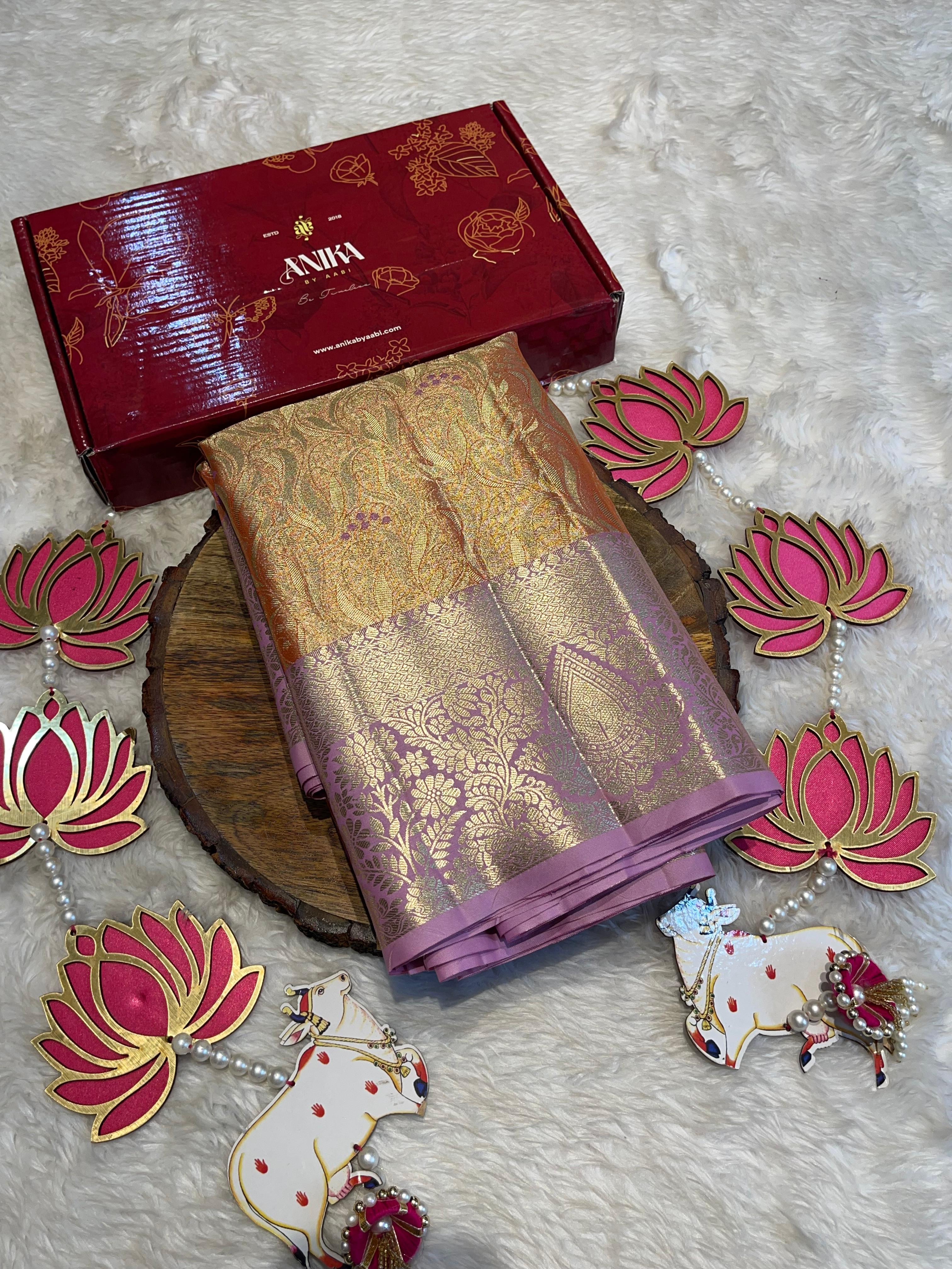 SWAYAMVARAM-ORANGISH PEACH WITH LILAC SAREE
