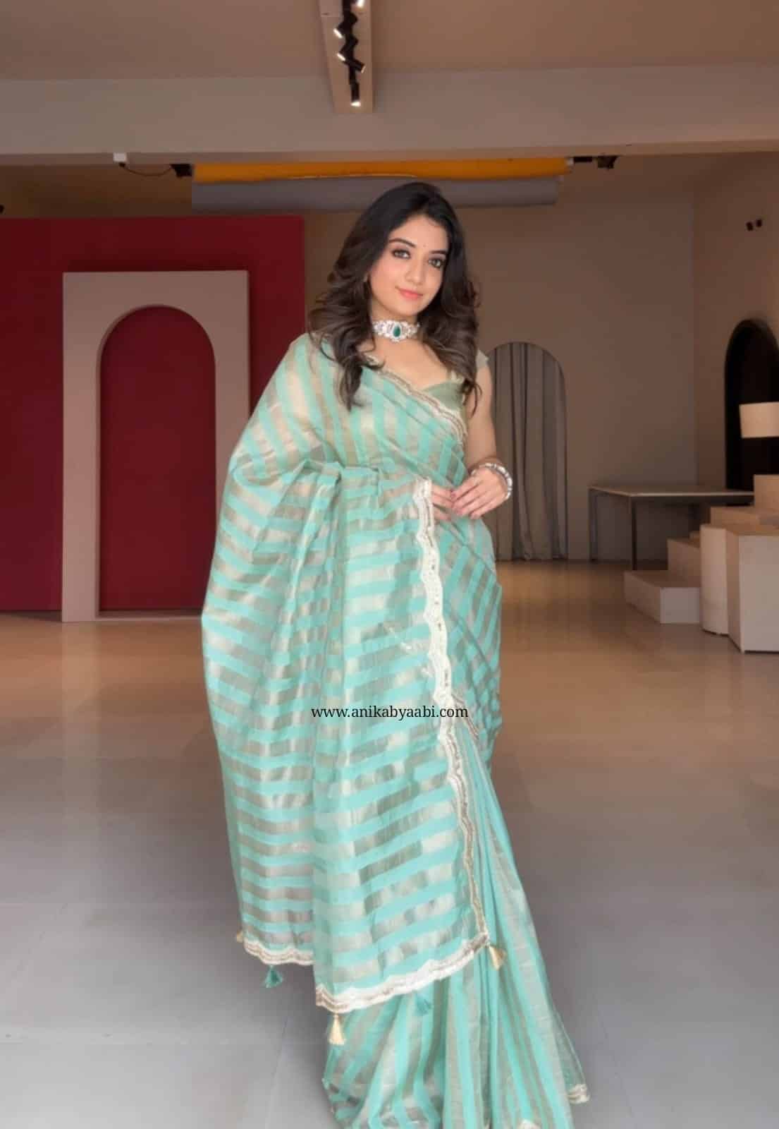 TRISH-REXONA GREEN SAREE