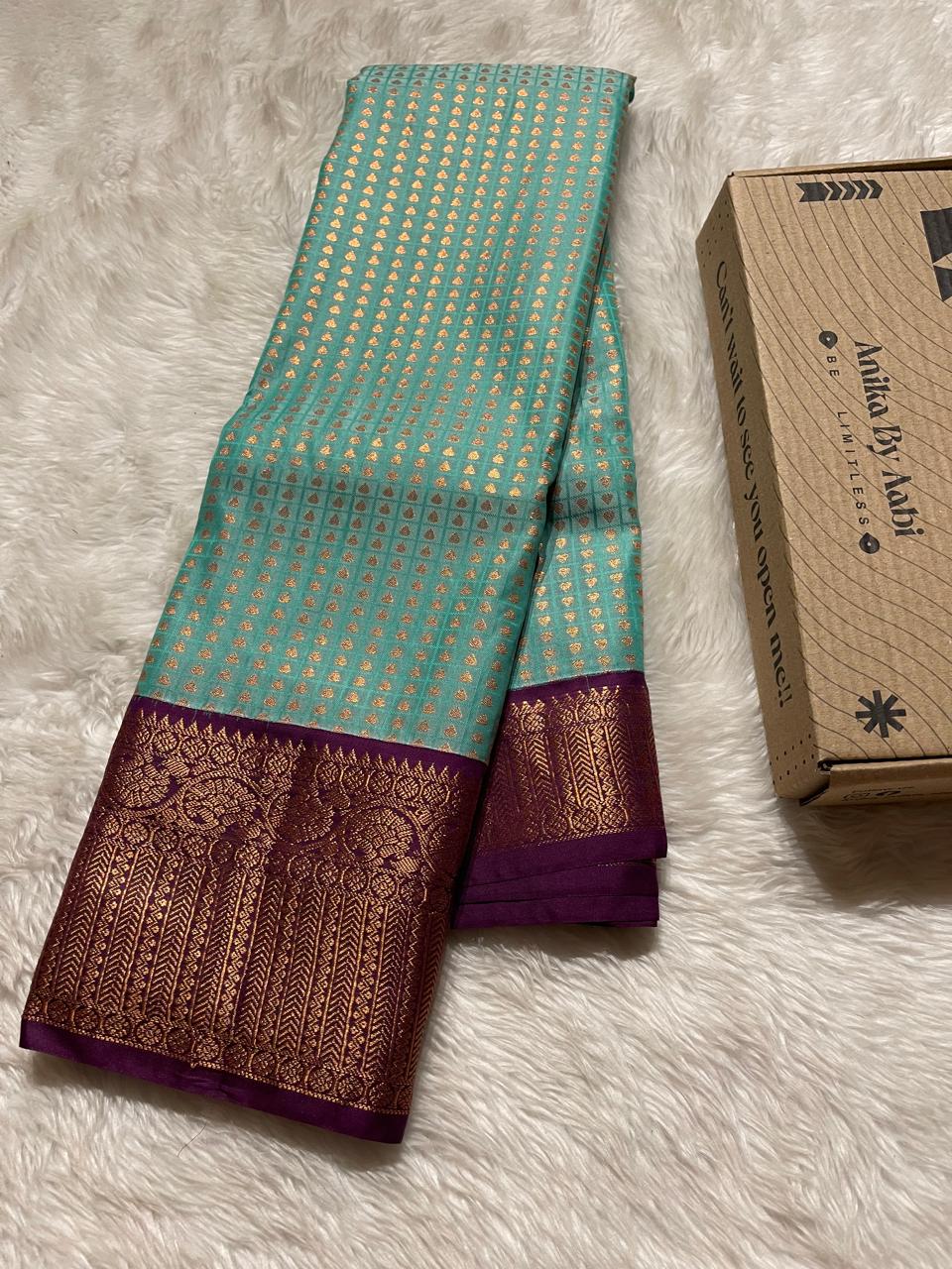 1000 BUTTAS-TURQUOISE WITH MAGENTA