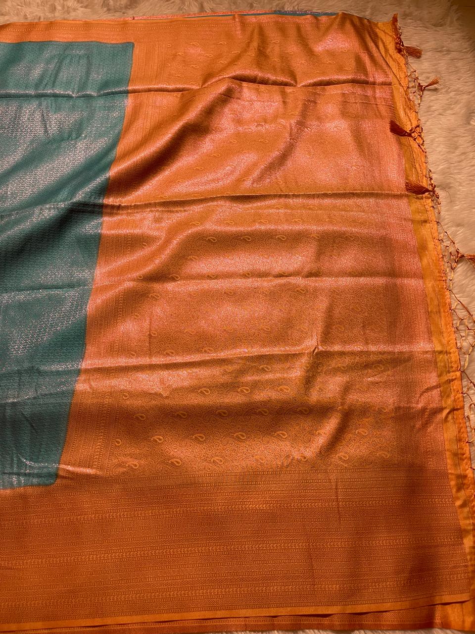 NINU-SKYBLUE WITH ORANGE SAREE