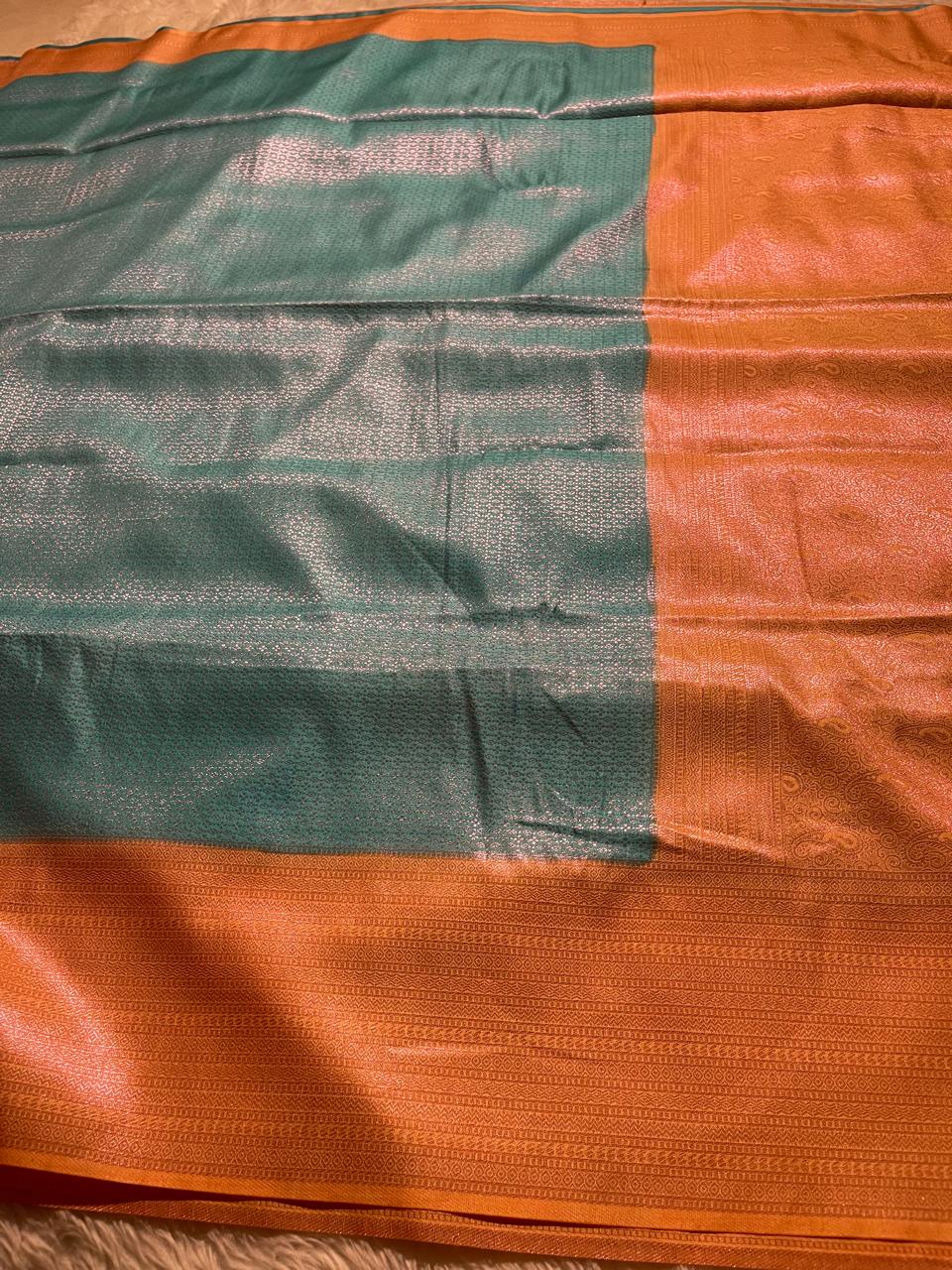 NINU-SKYBLUE WITH ORANGE SAREE