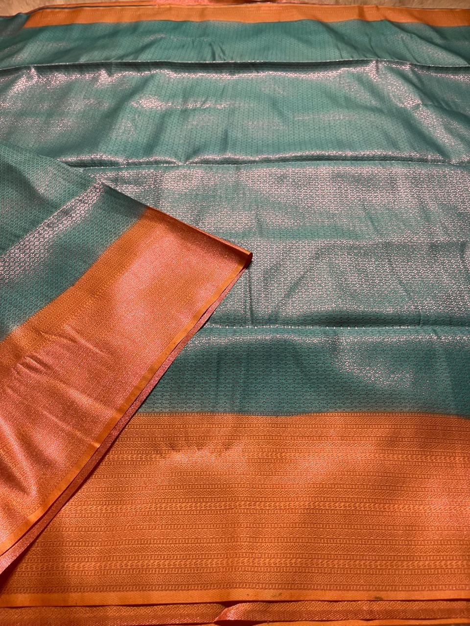 NINU-SKYBLUE WITH ORANGE SAREE