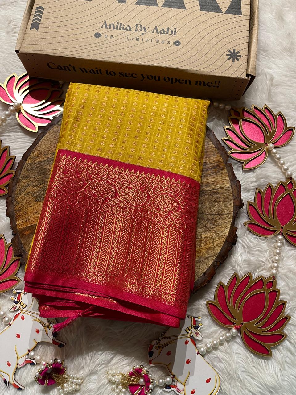 1000 BUTTAS-MANGO YELLOW WITH PINK SAREE