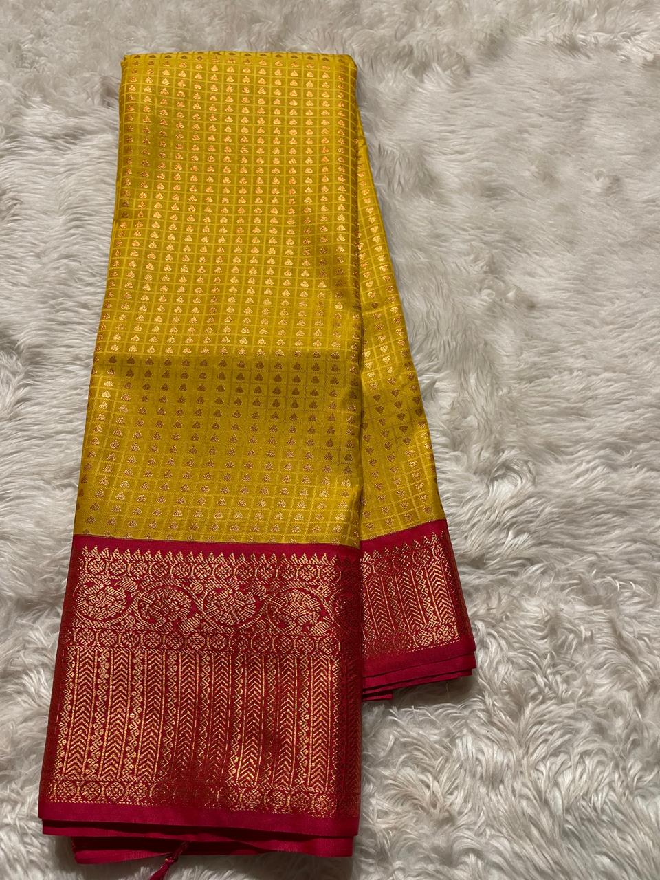 1000 BUTTAS-MANGO YELLOW WITH PINK SAREE