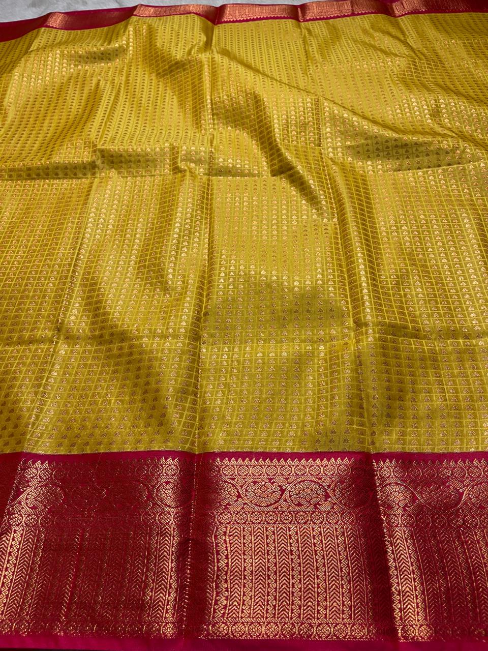 1000 BUTTAS-MANGO YELLOW WITH PINK SAREE