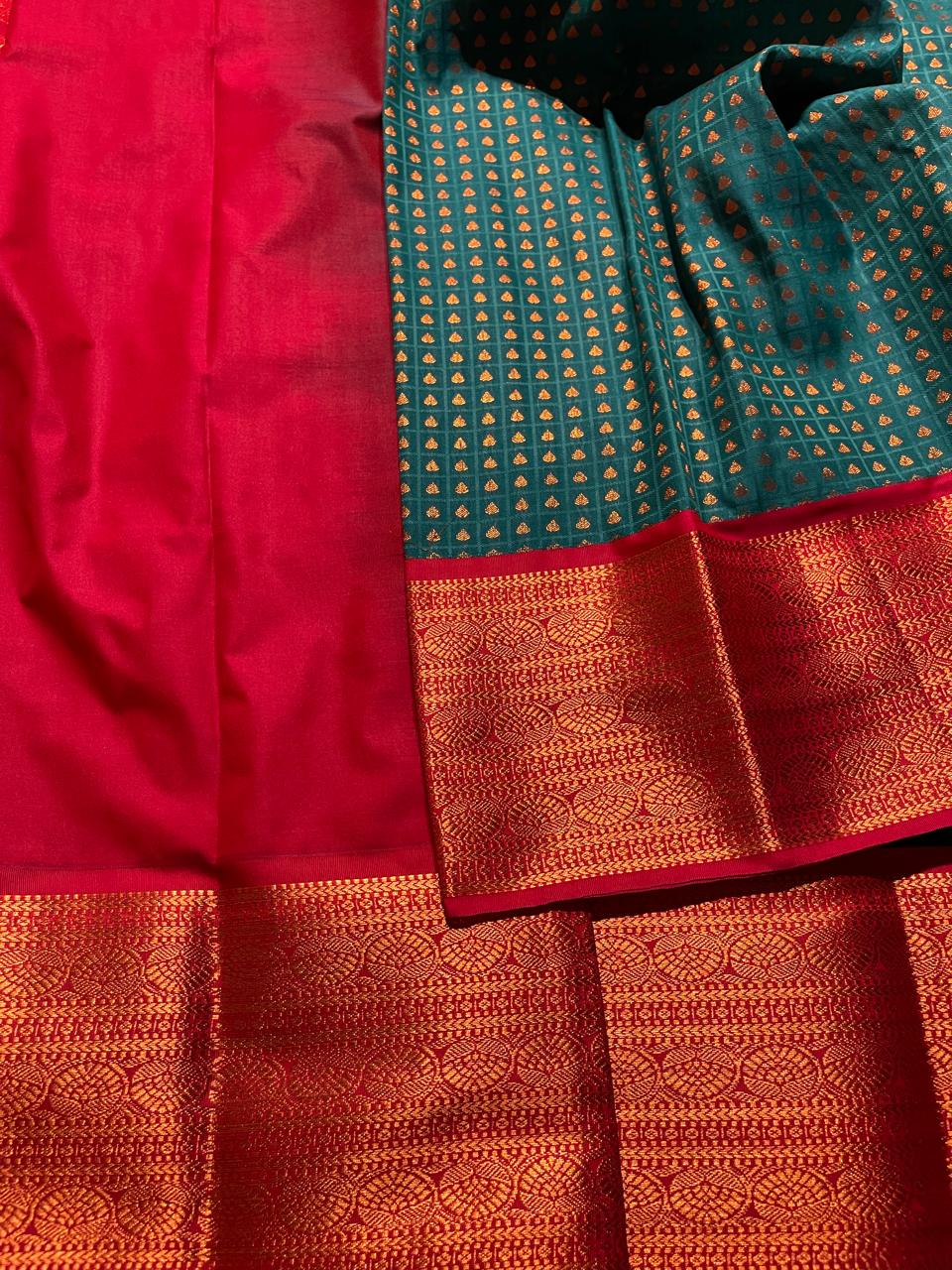 1000 BUTTAS-PEACOCK GREEN WITH PINK SAREE