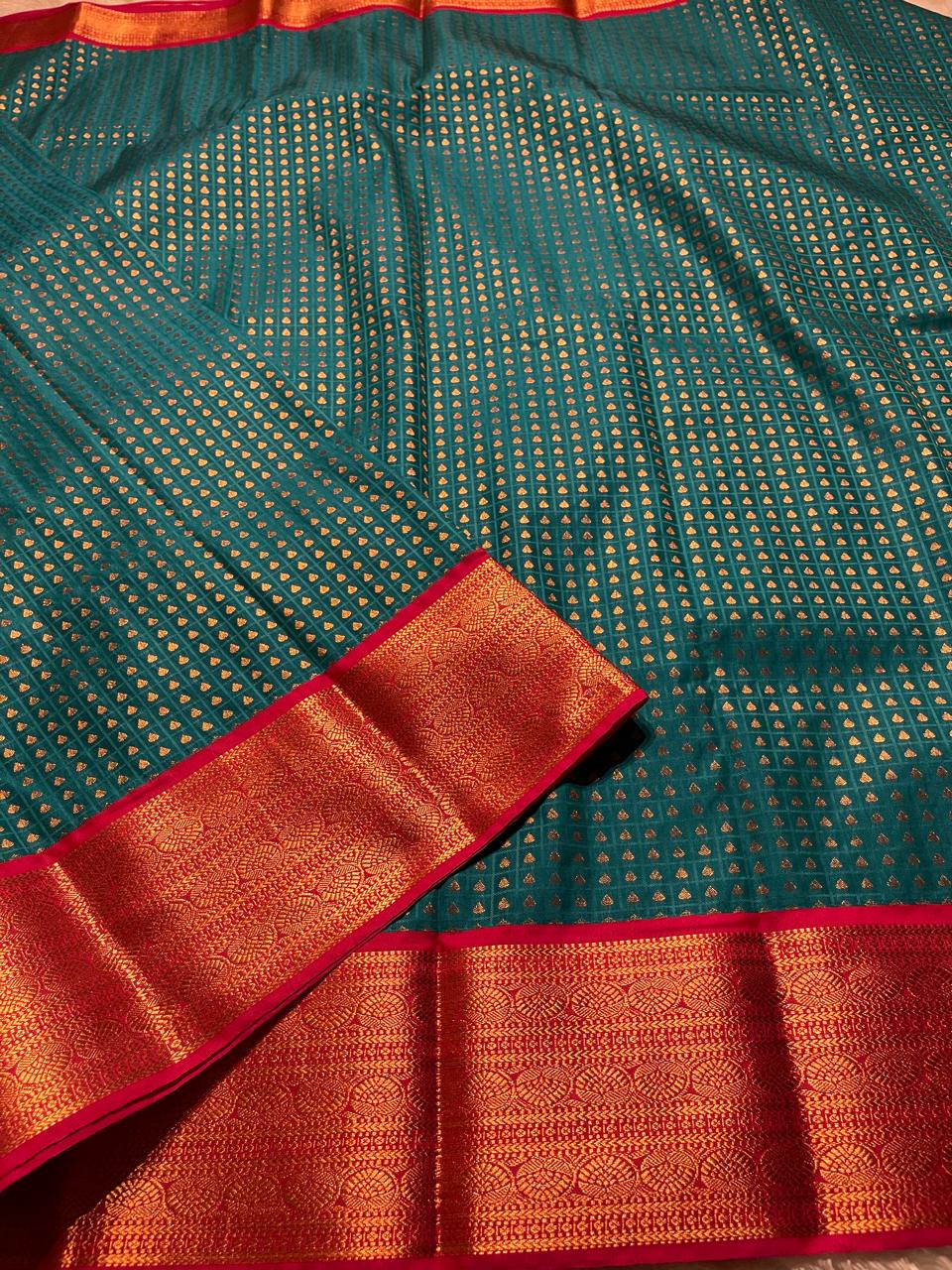 1000 BUTTAS-PEACOCK GREEN WITH PINK SAREE