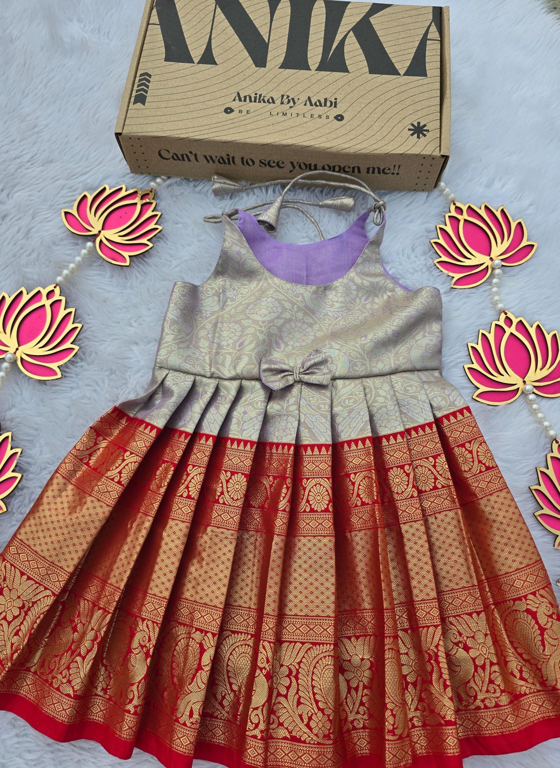 SWAYAM KIDS FROCK-PASTEL LILAC WITH RED ANNAPAKSHI BIG BORDER