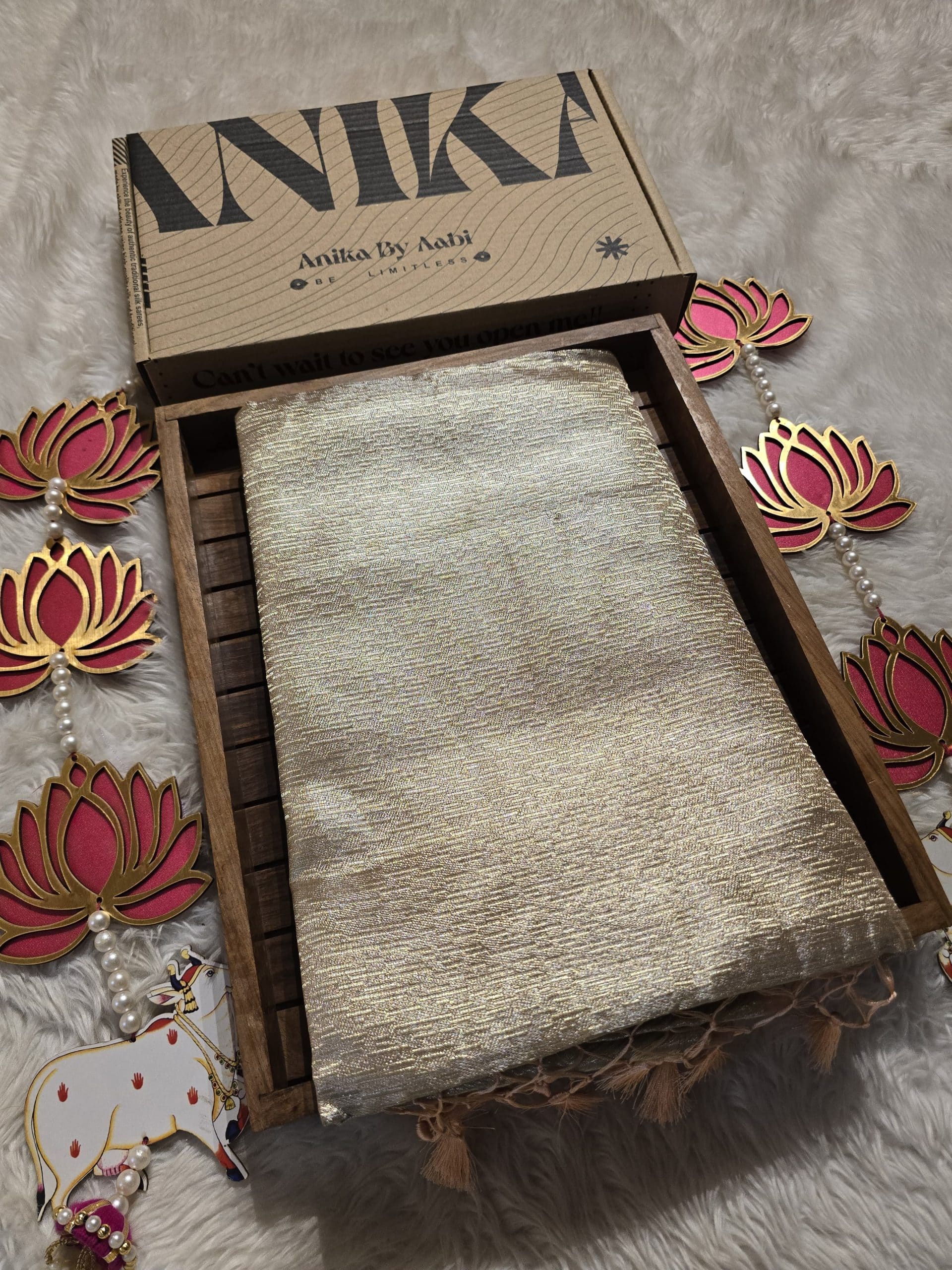 HEERA-SILVER WITH PEACH SAREE