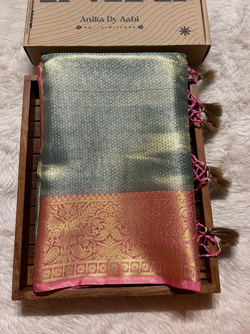 RADHIKA-PASTEL BLUE WITH PINK SAREE