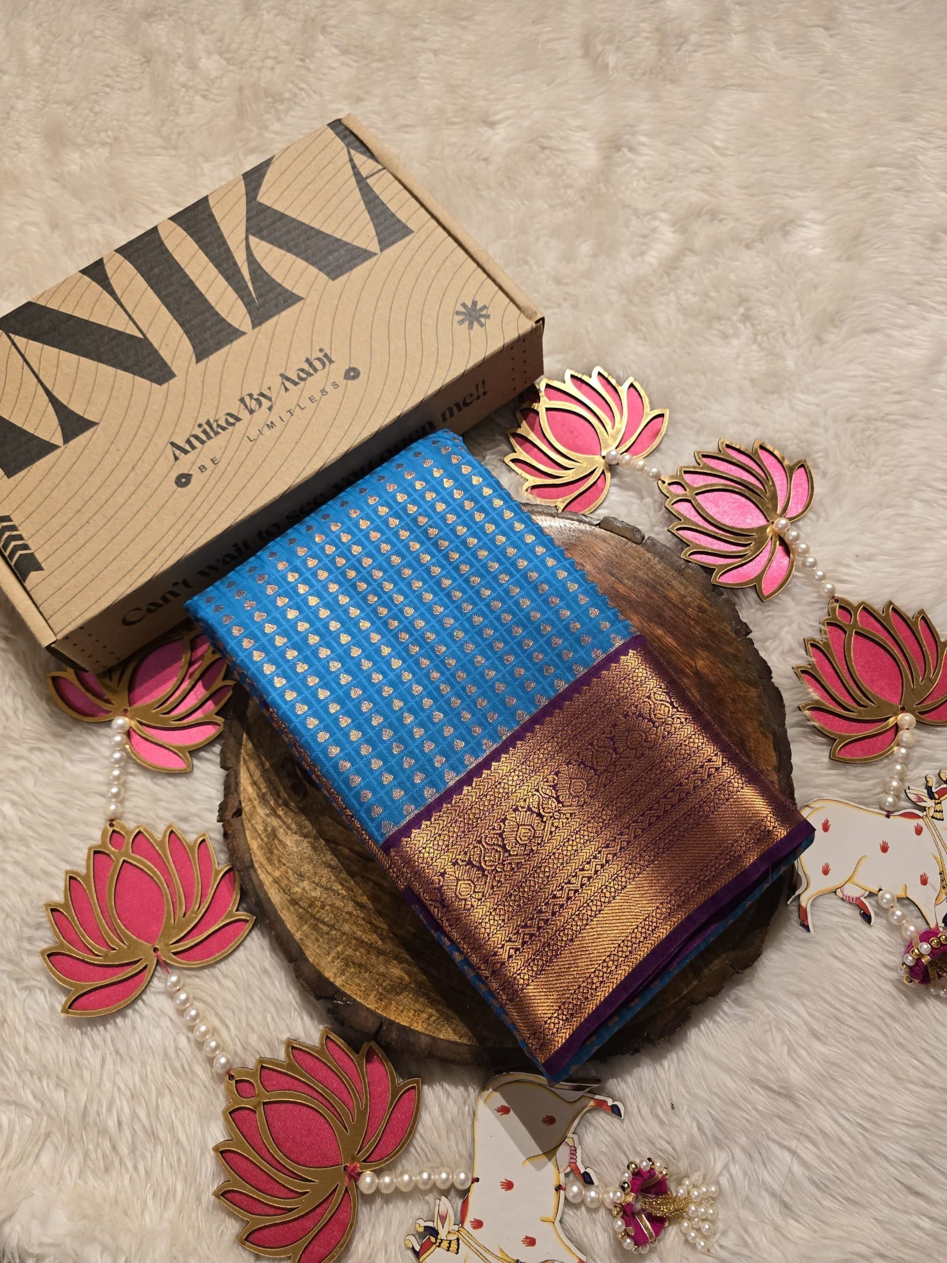 1000 BUTTAS-CERULEAN BLUE WITH MAGENTA SAREE