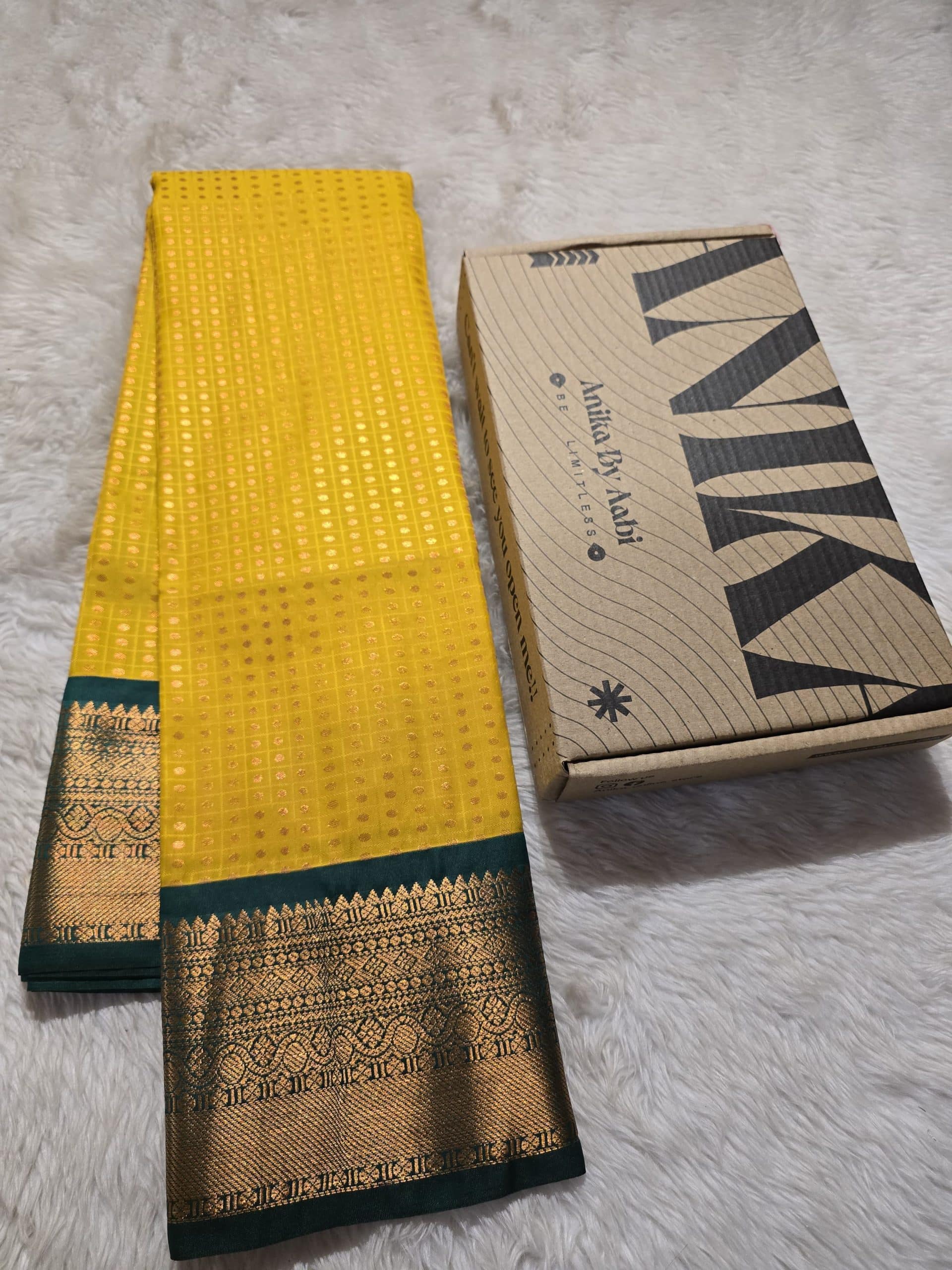 1000 BUTTAS-YELLOW WITH BOTTLE GREEN SAREE
