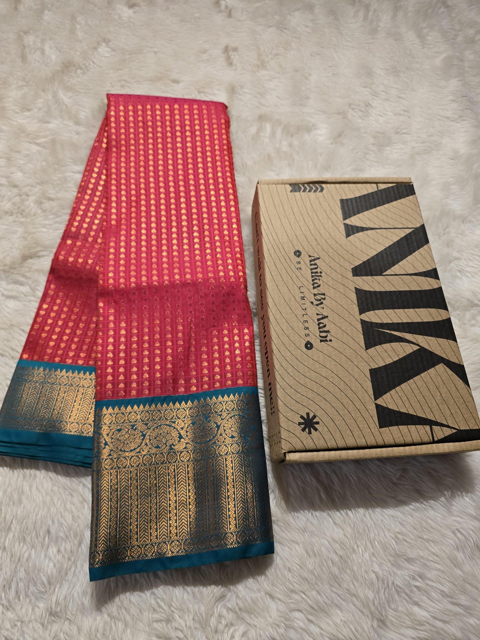 1000 BUTTAS-RED WITH TEAL GREEN SAREE