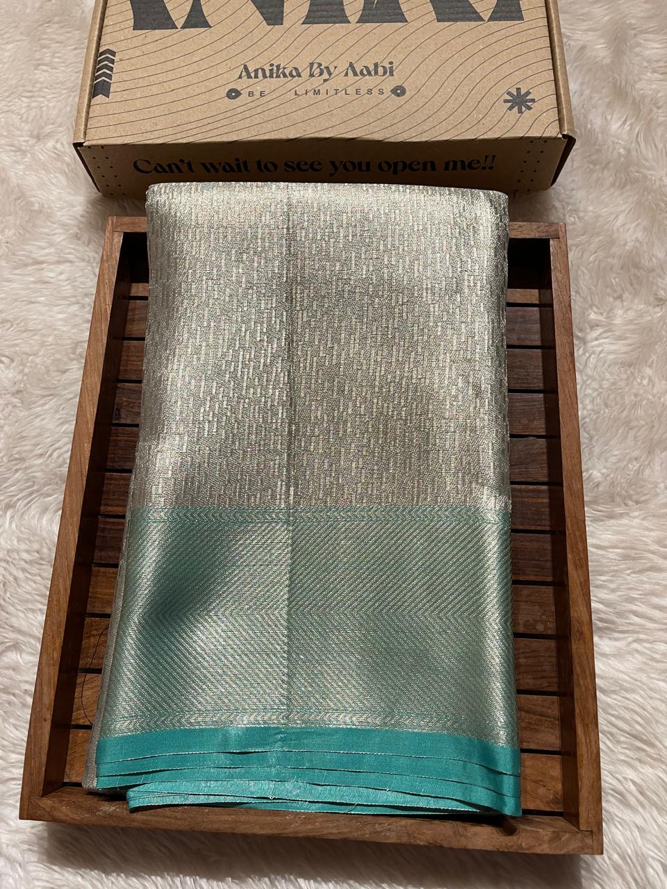HEERA-GREEN WITH SILVER DUAL TONE SAREE