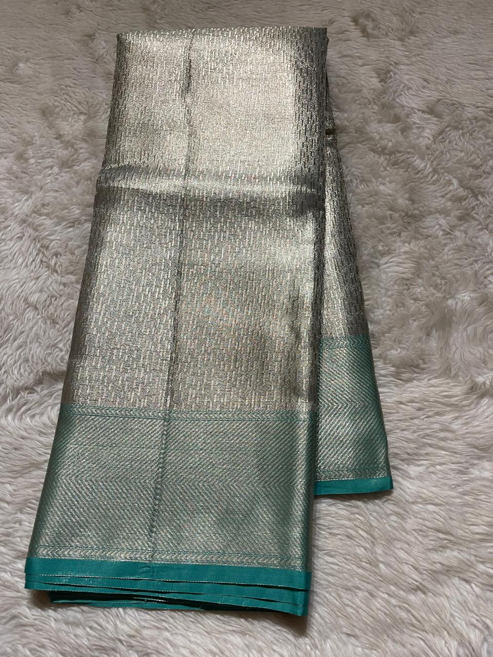 HEERA-GREEN WITH SILVER DUAL TONE SAREE
