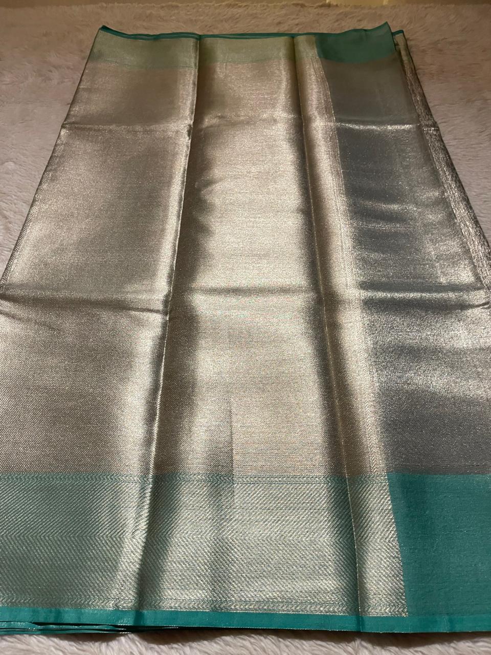 HEERA-GREEN WITH SILVER DUAL TONE SAREE