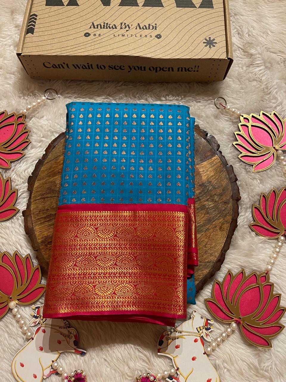 1000 BUTTAS-CERULEAN BLUE WITH PINK SAREE