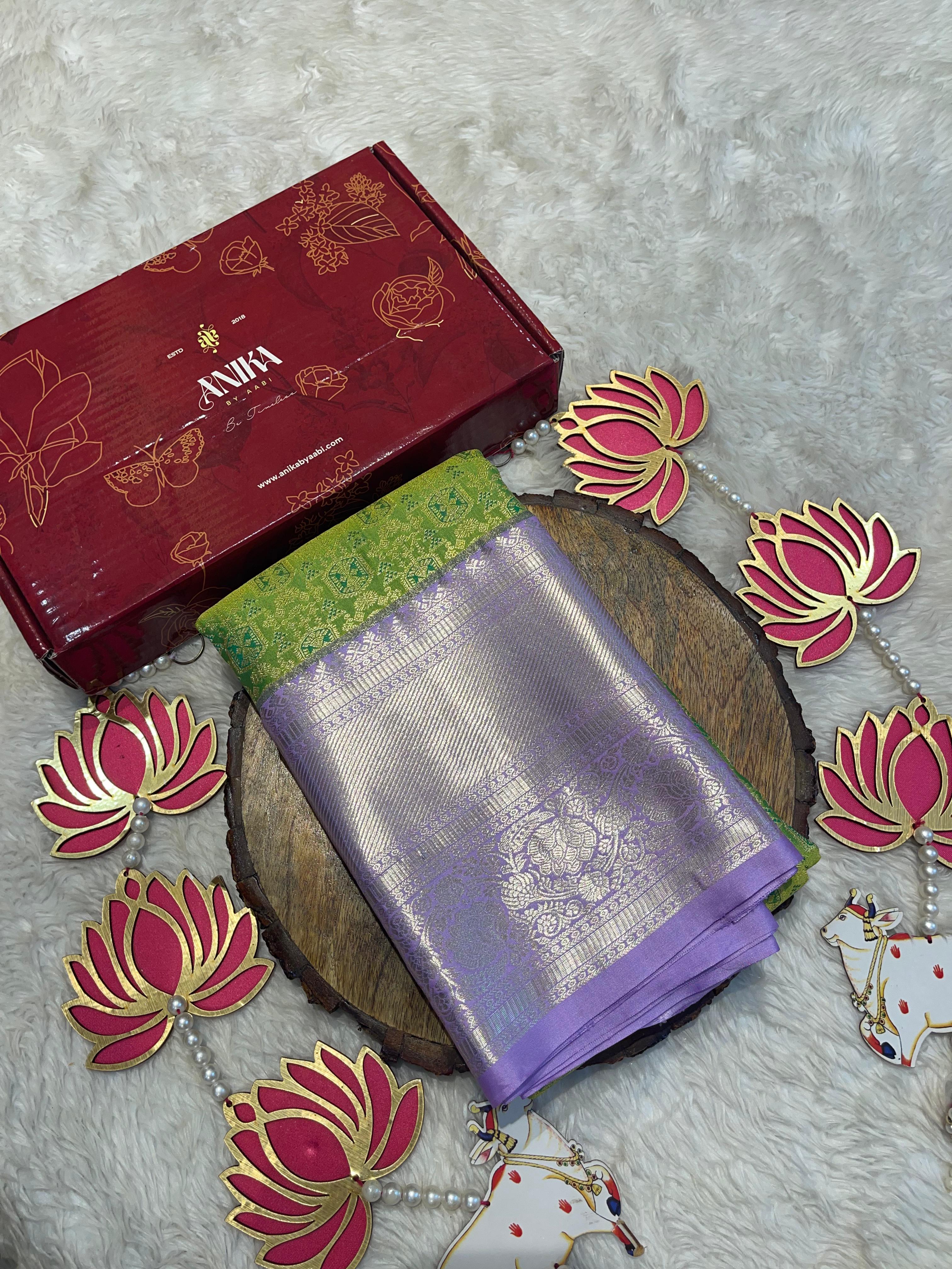 SWAYAMVARAM- EXCLUSIVE GREEN WITH LILAC SILK SAREE