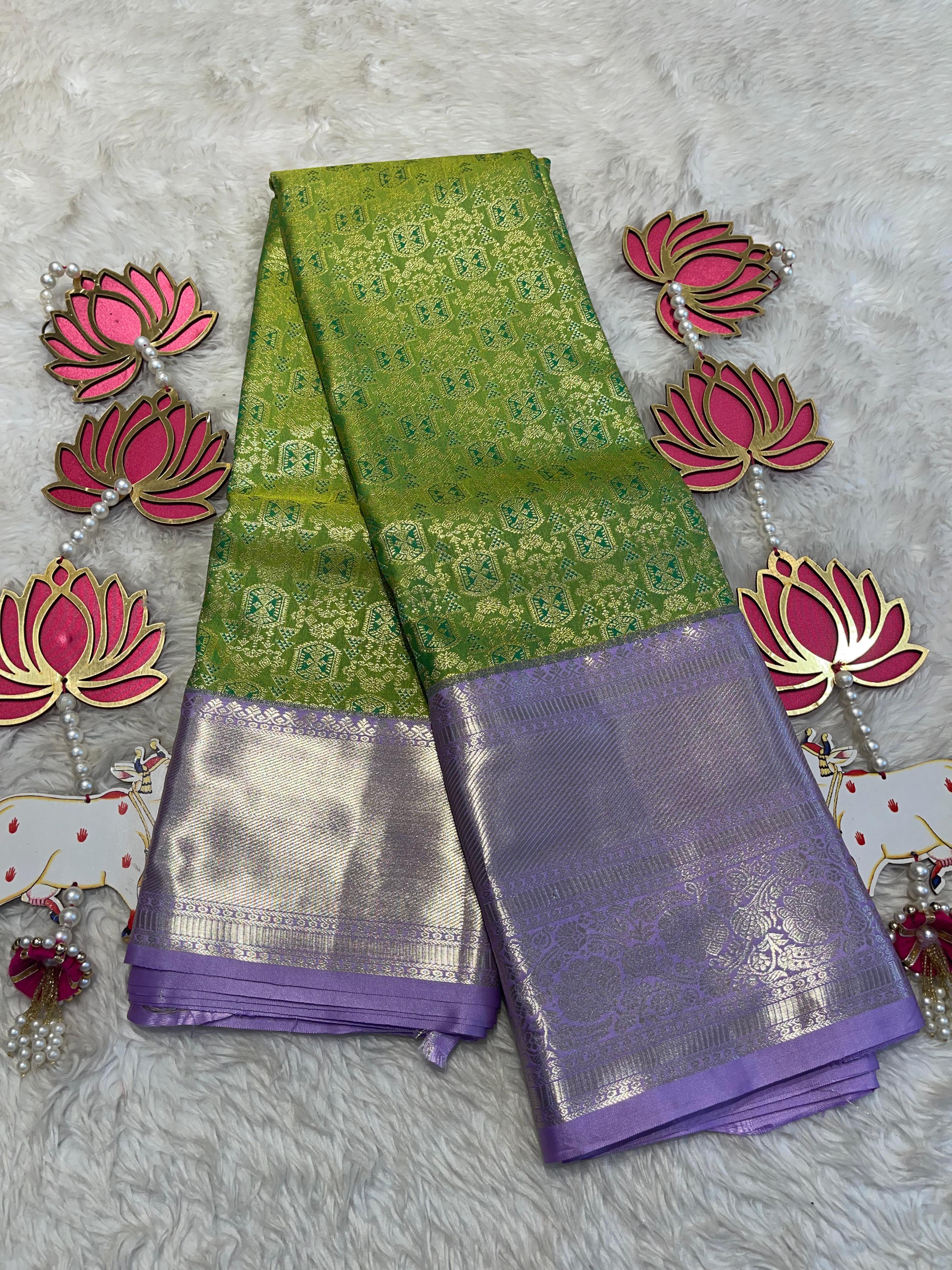 SWAYAMVARAM- EXCLUSIVE GREEN WITH LILAC SILK SAREE