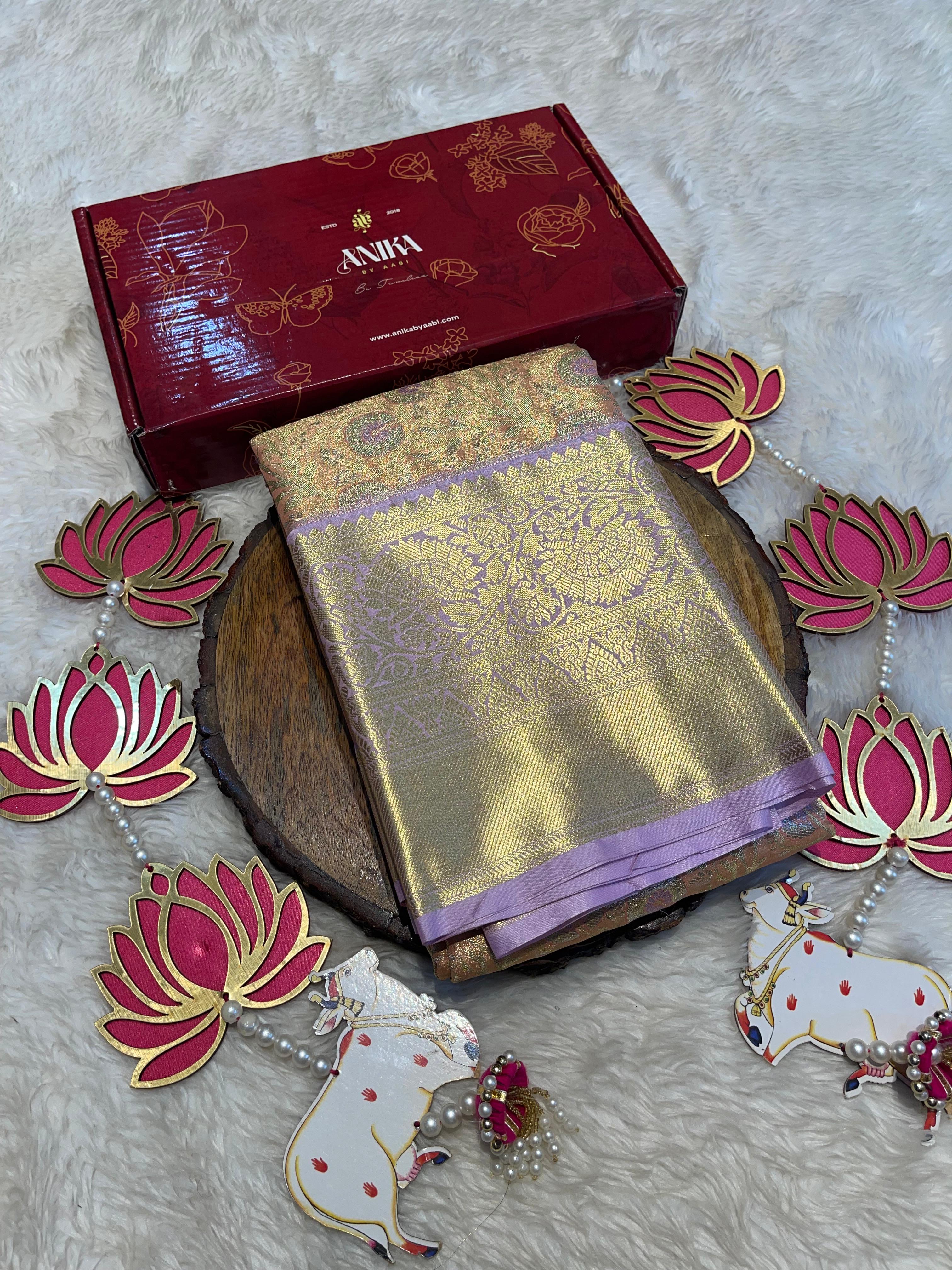 SWAYAMVARAM-LIGHT ORANGE WITH LILAC BROCADE SAREE