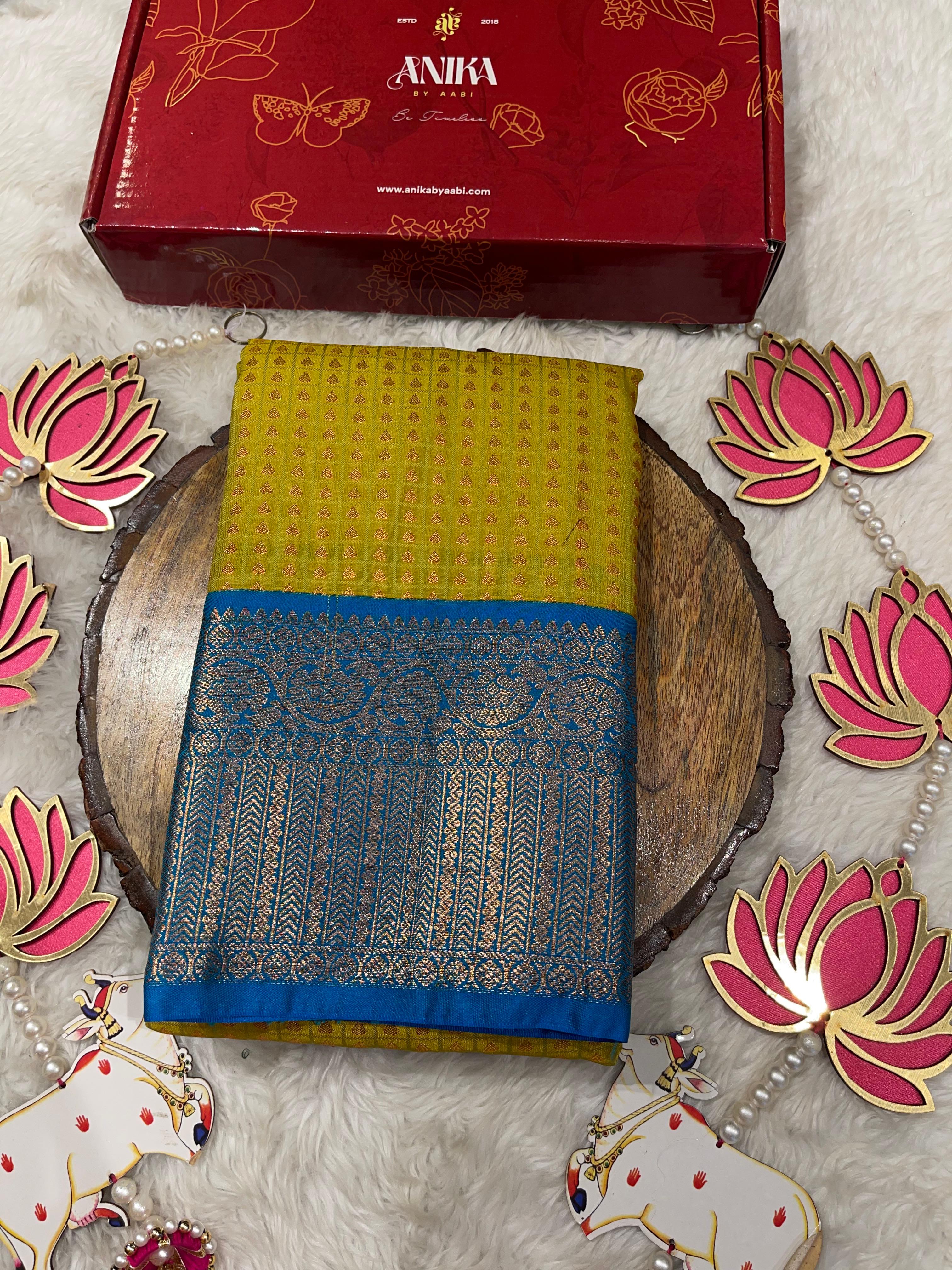 1000 BUTTAS-LIMEYELLOW WITH BOTTLEGREEN SAREE