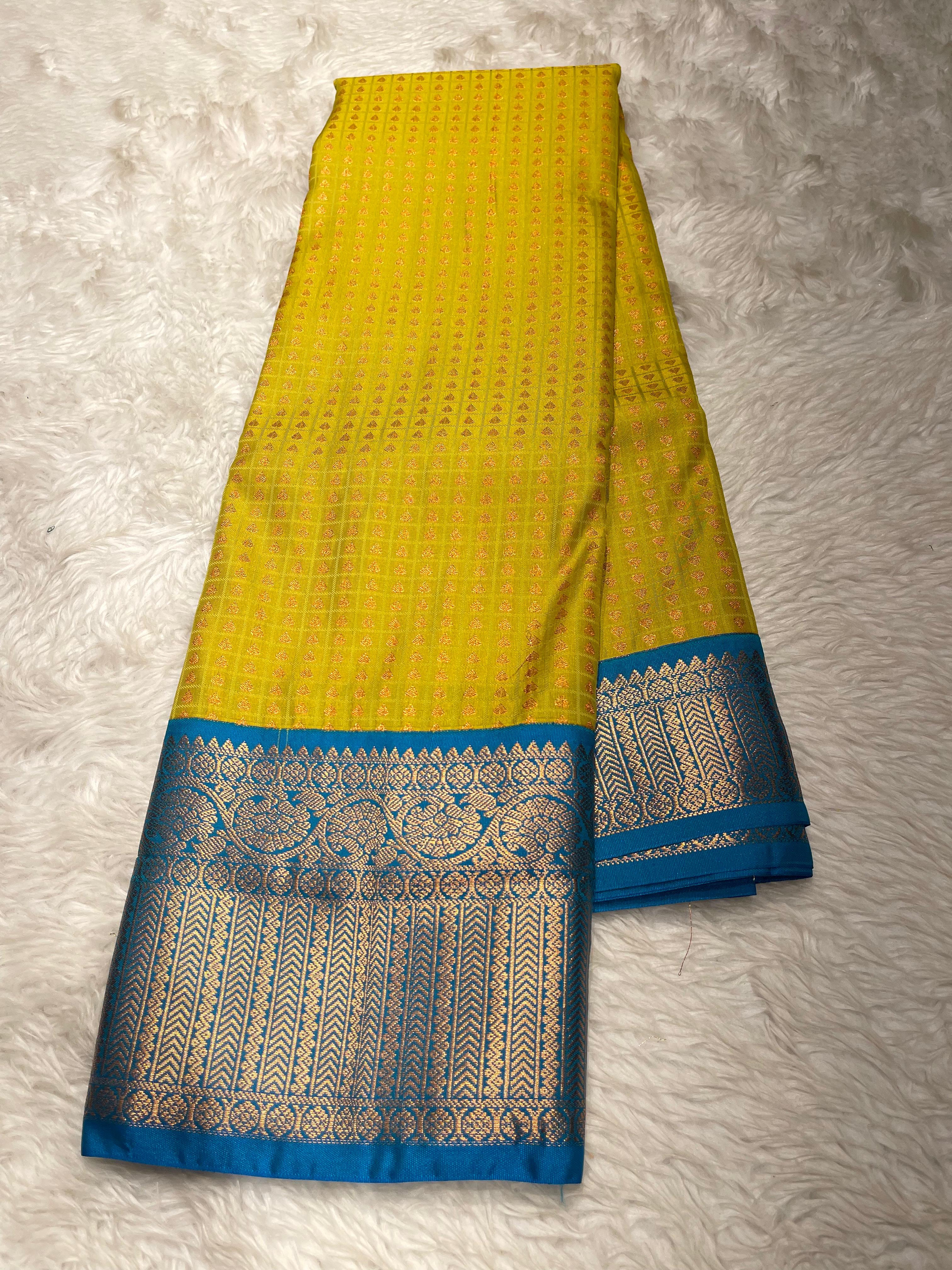 1000 BUTTAS-LIMEYELLOW WITH BOTTLEGREEN SAREE