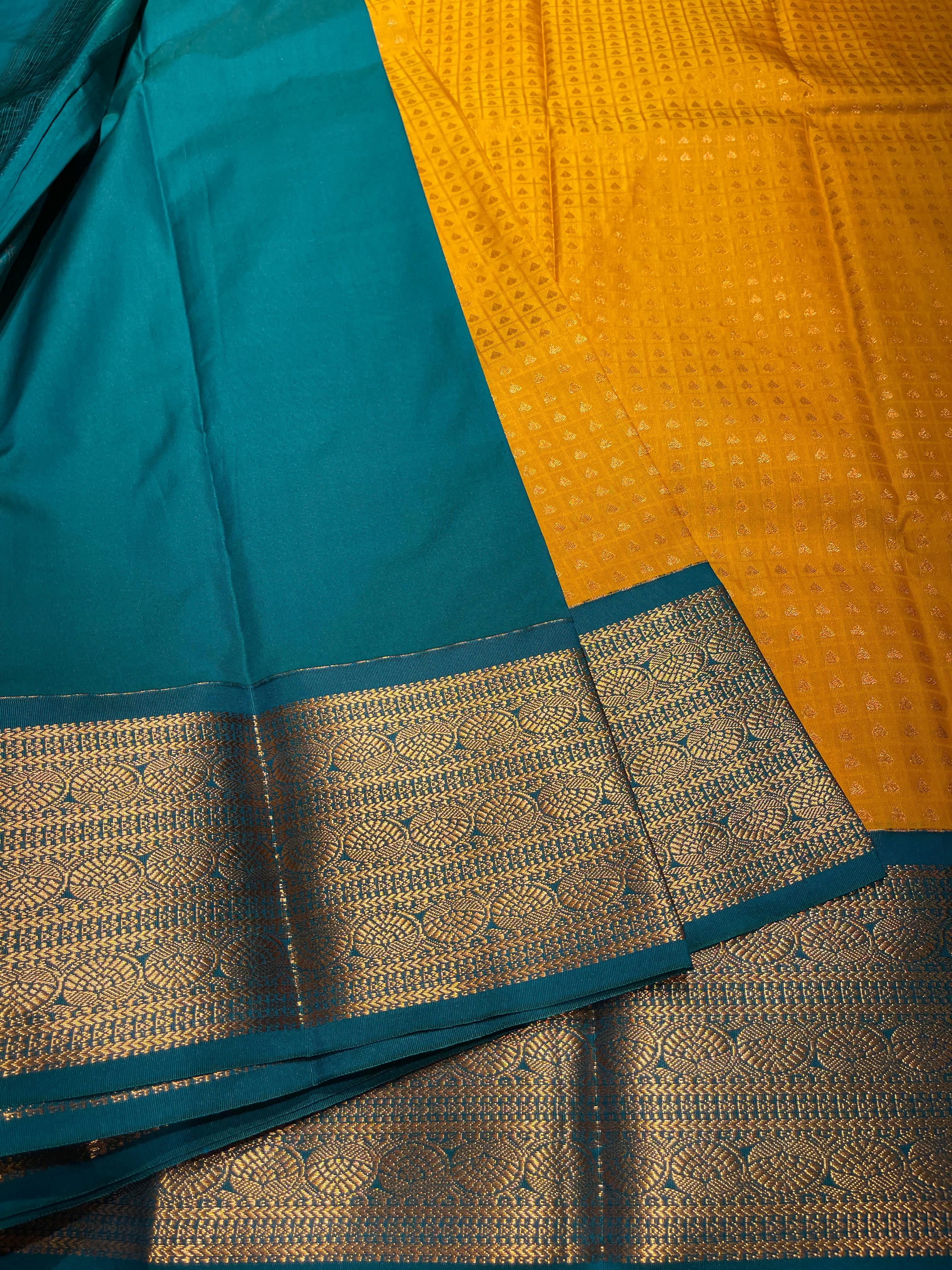 1000 BUTTAS-MANJAL WITH BOTTLEGREEN SAREE