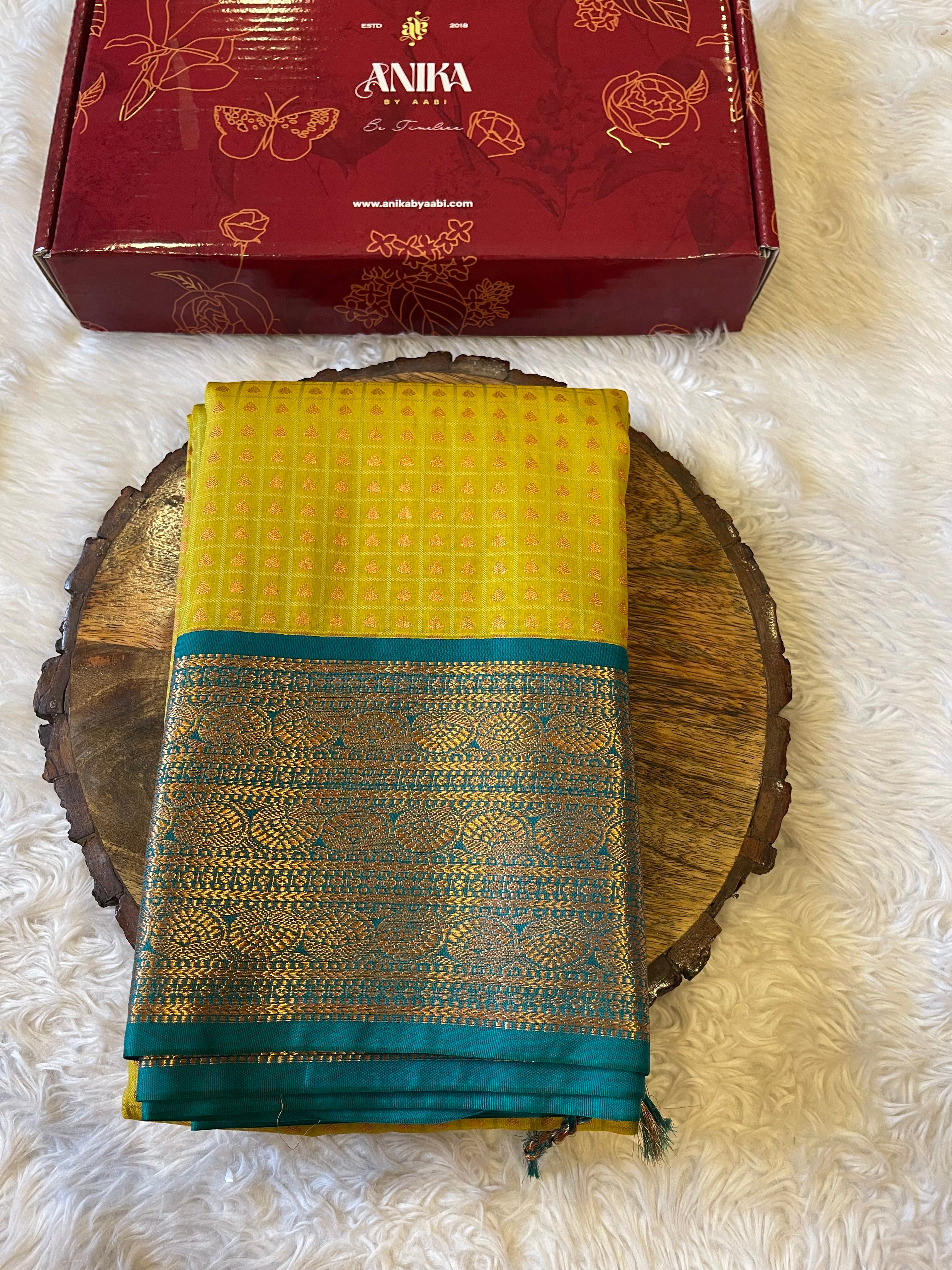 1000 BUTTAS-LEMONYELLOW WITH GREEN SAREE