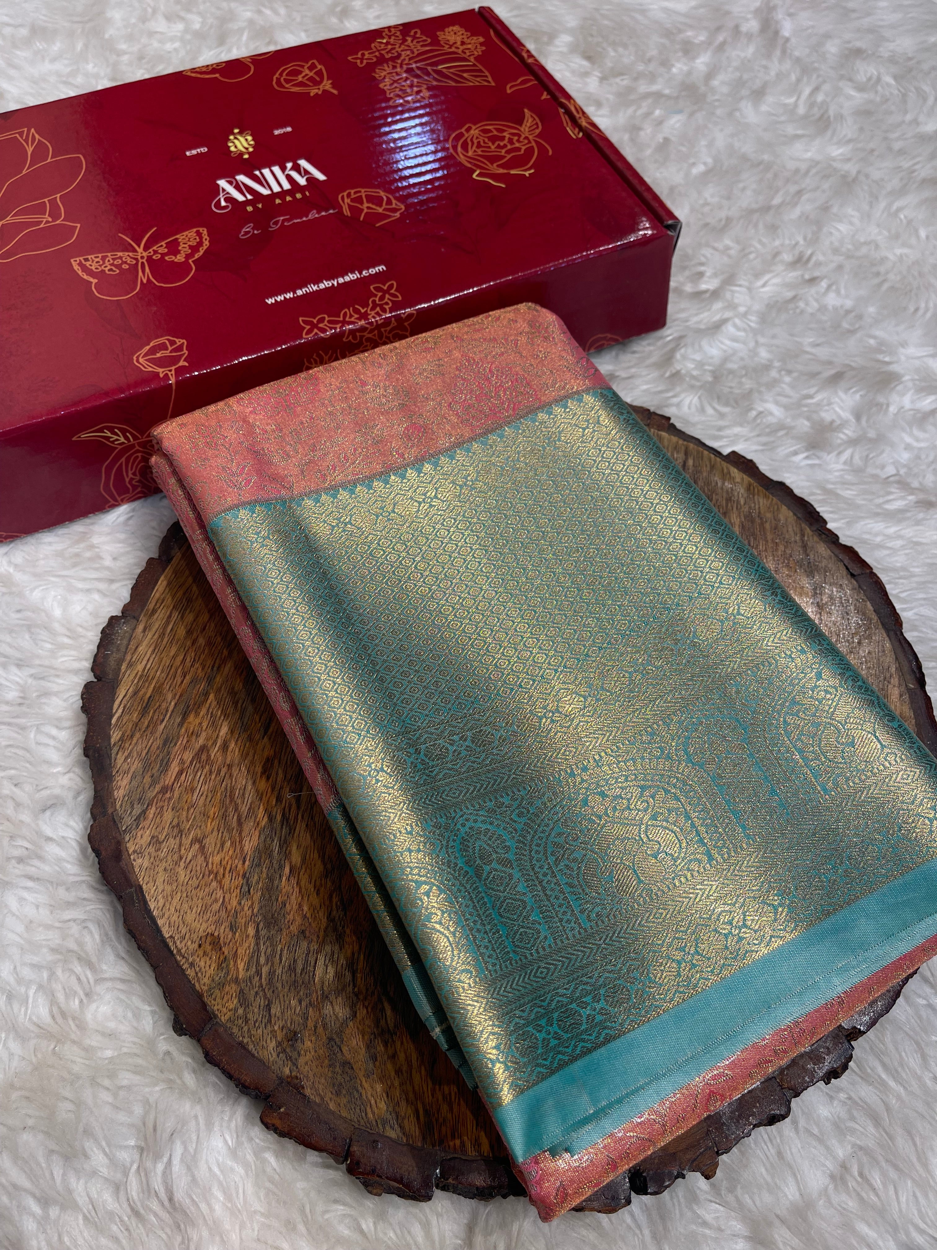 SWAYAMVARAM-DARKPEACH WITH LIGHT TEAL SAREE