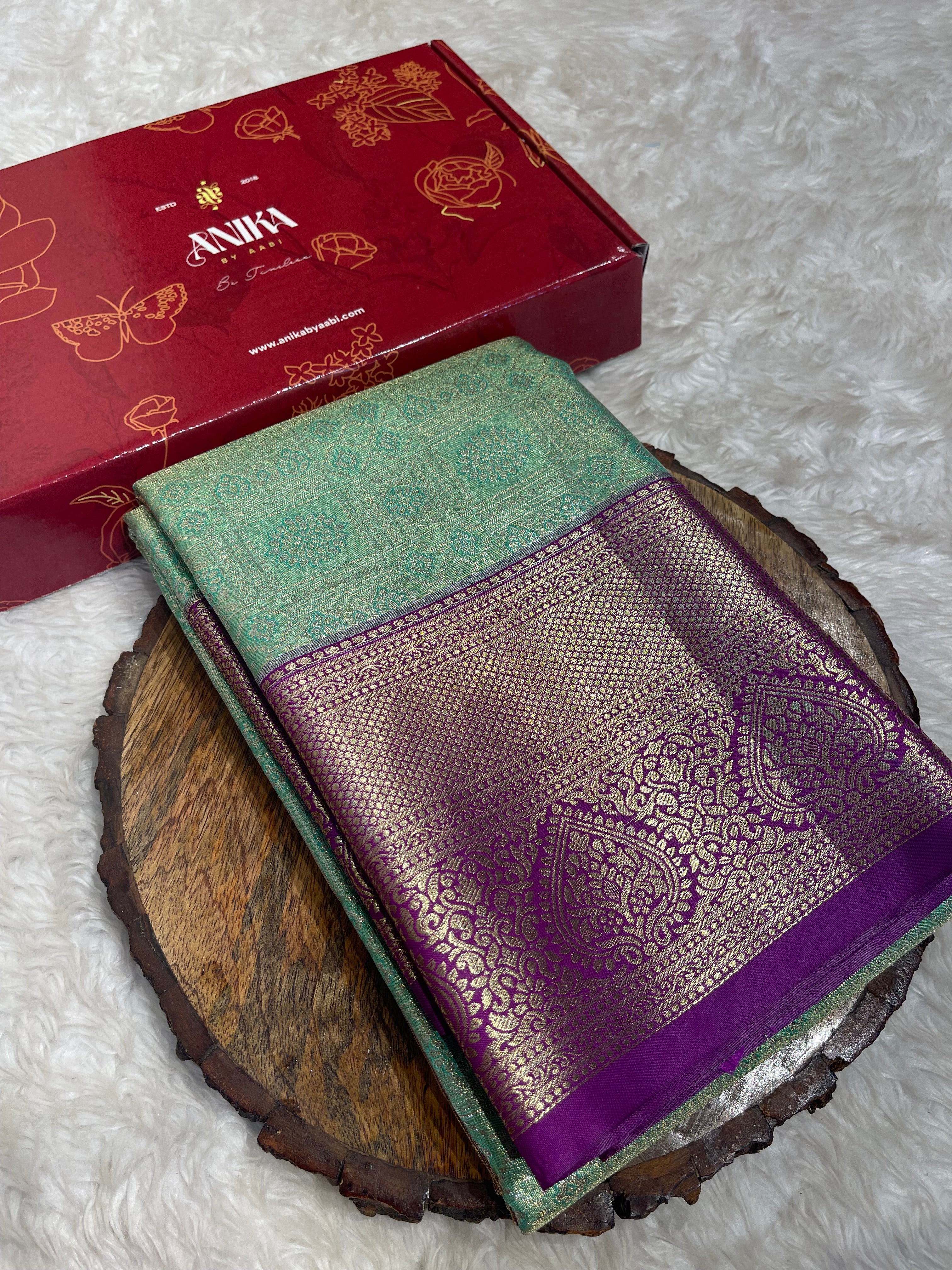 SWAYAMVARAM-GREEN WITH PURPLE SAREE