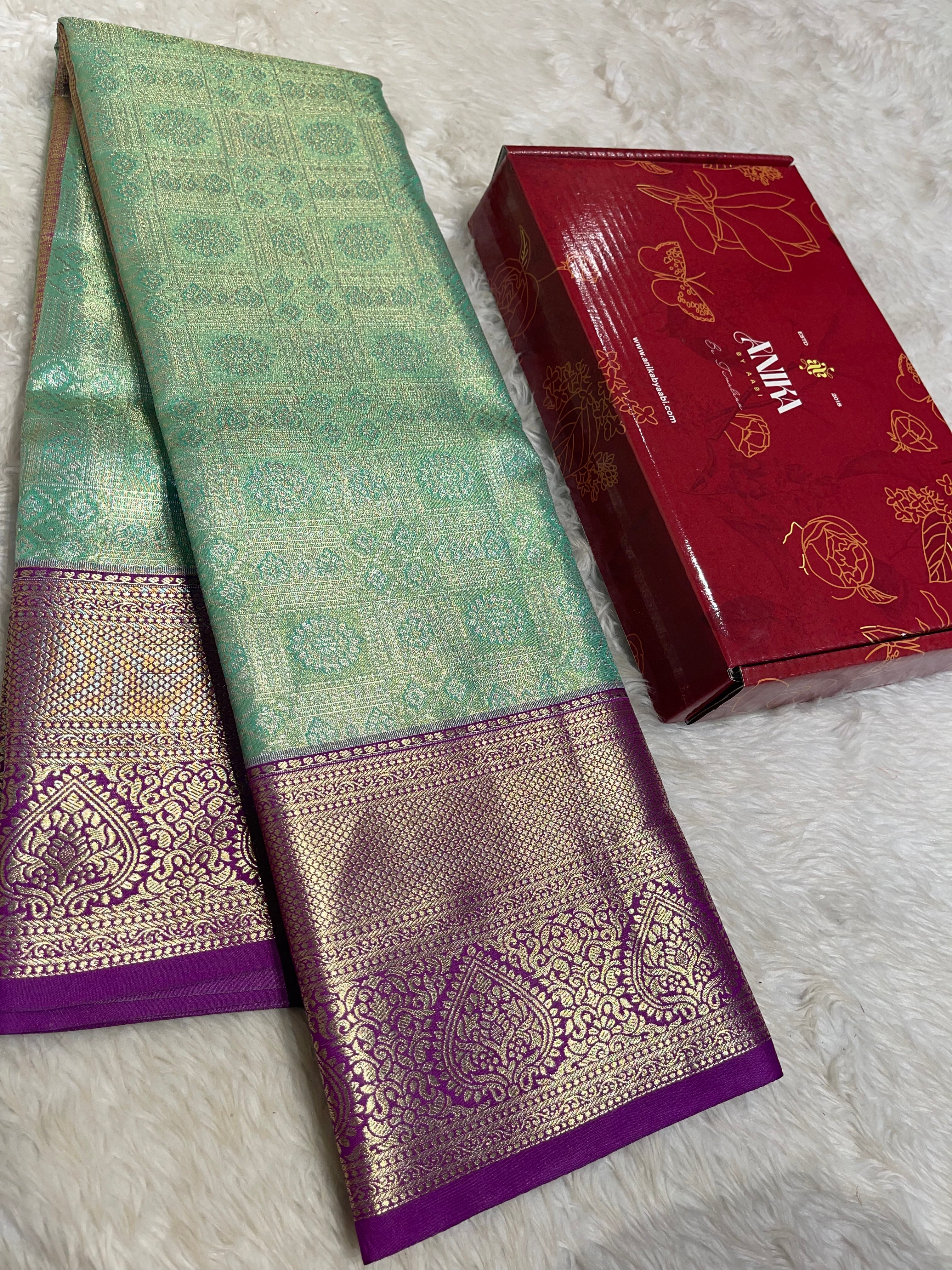 SWAYAMVARAM-GREEN WITH PURPLE SAREE