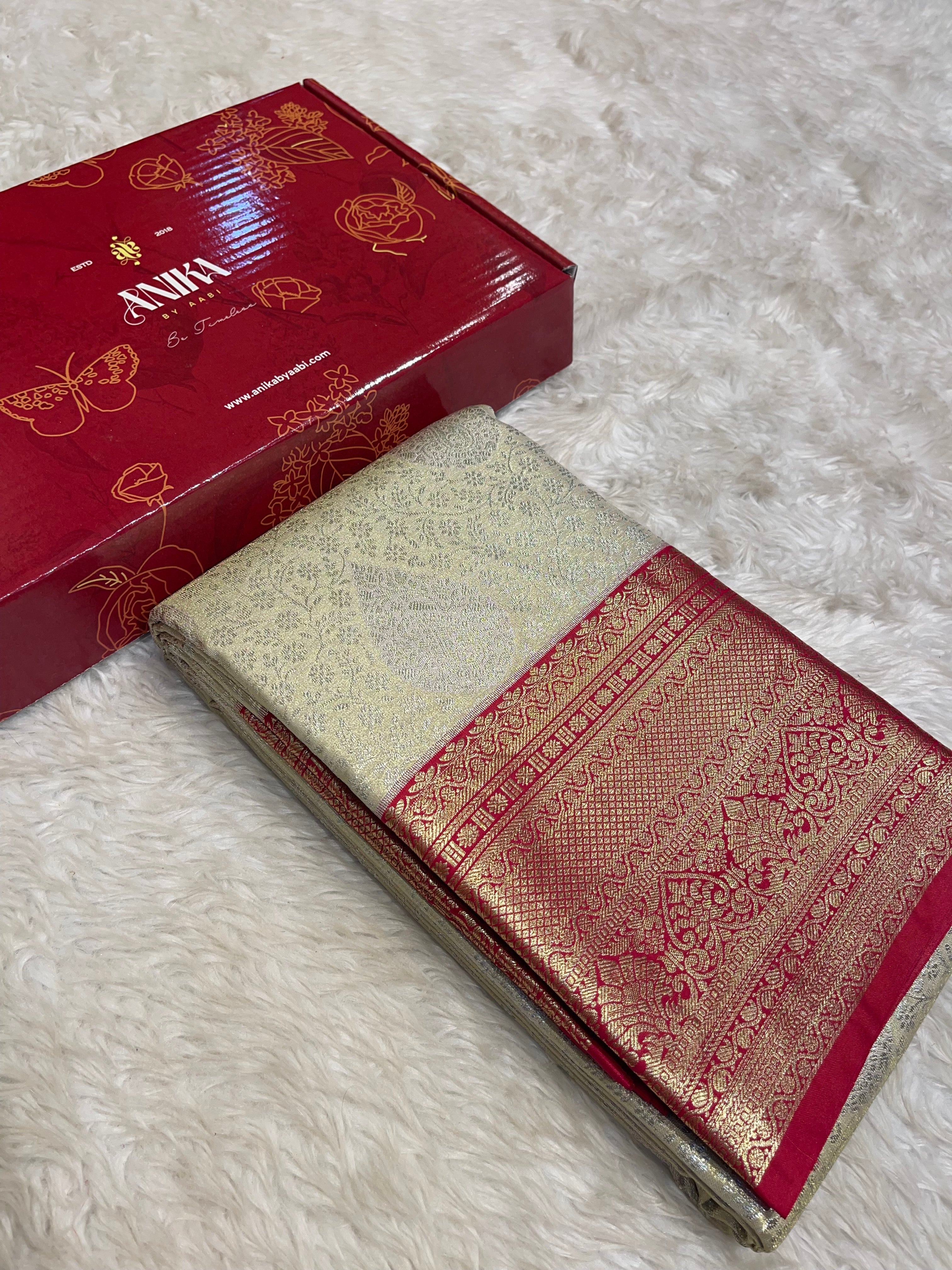 SWAYAMVARAM-HALFWHITE WITH RED SAREE