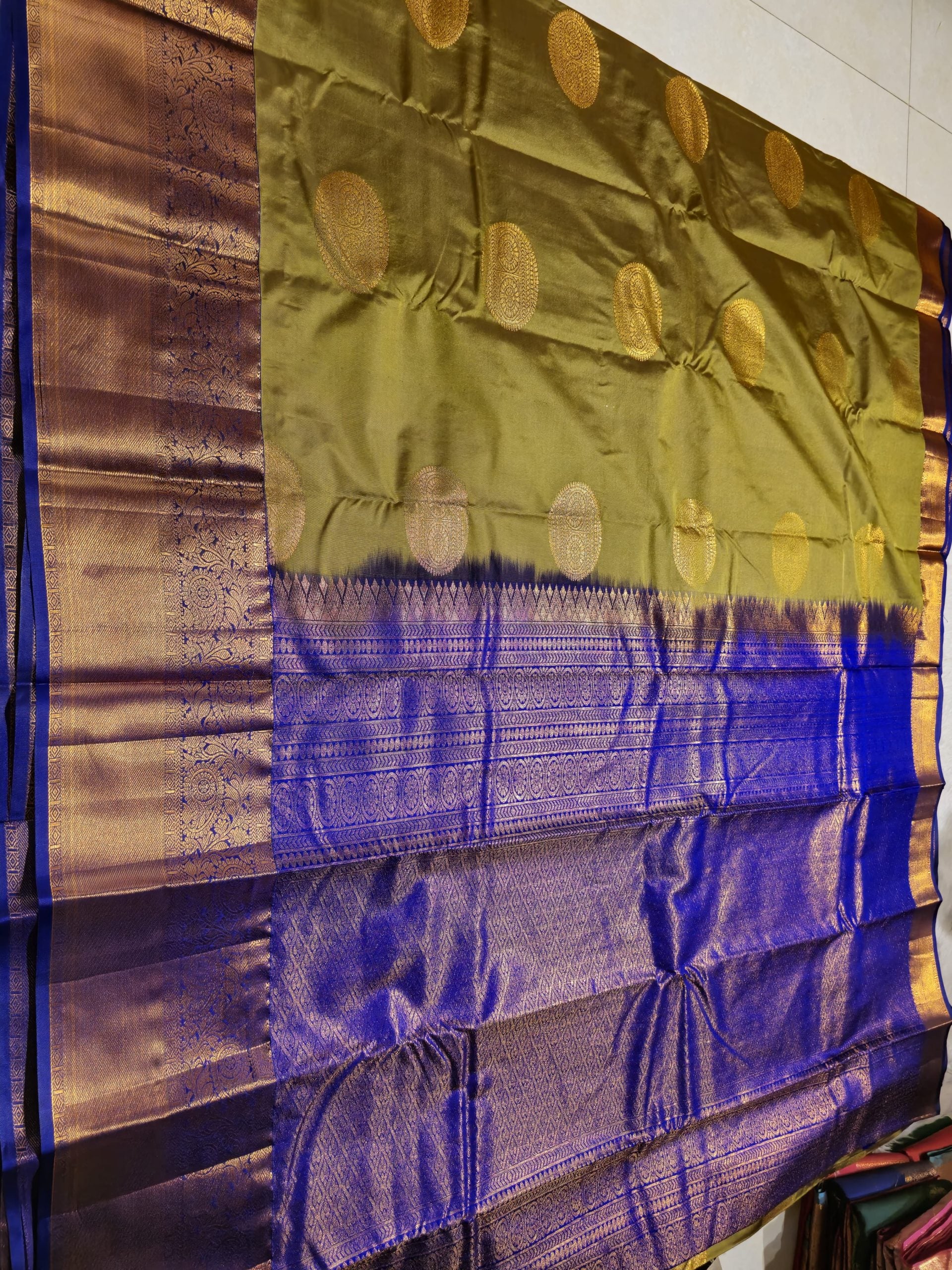 VARAMAHA LAKSHMI SPECIAL-OLIVE GREEN WITH VIOLET SAREE