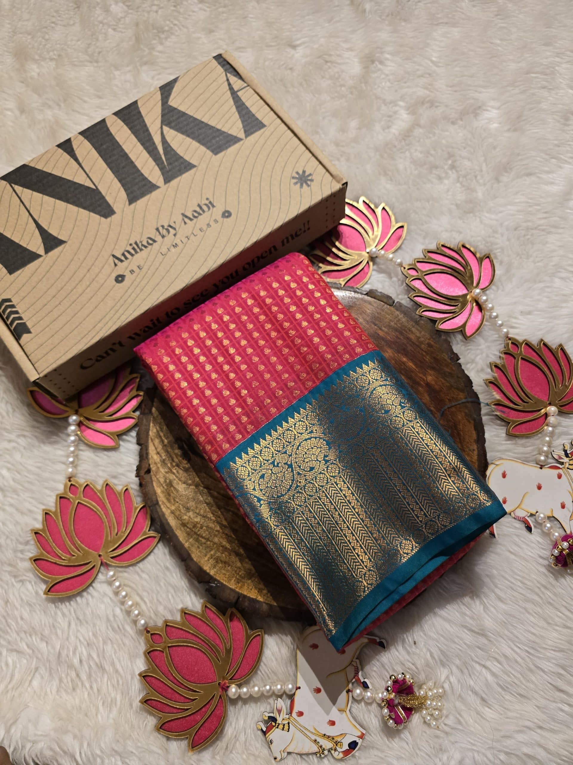 1000 BUTTAS-RED WITH TEAL GREEN SAREE