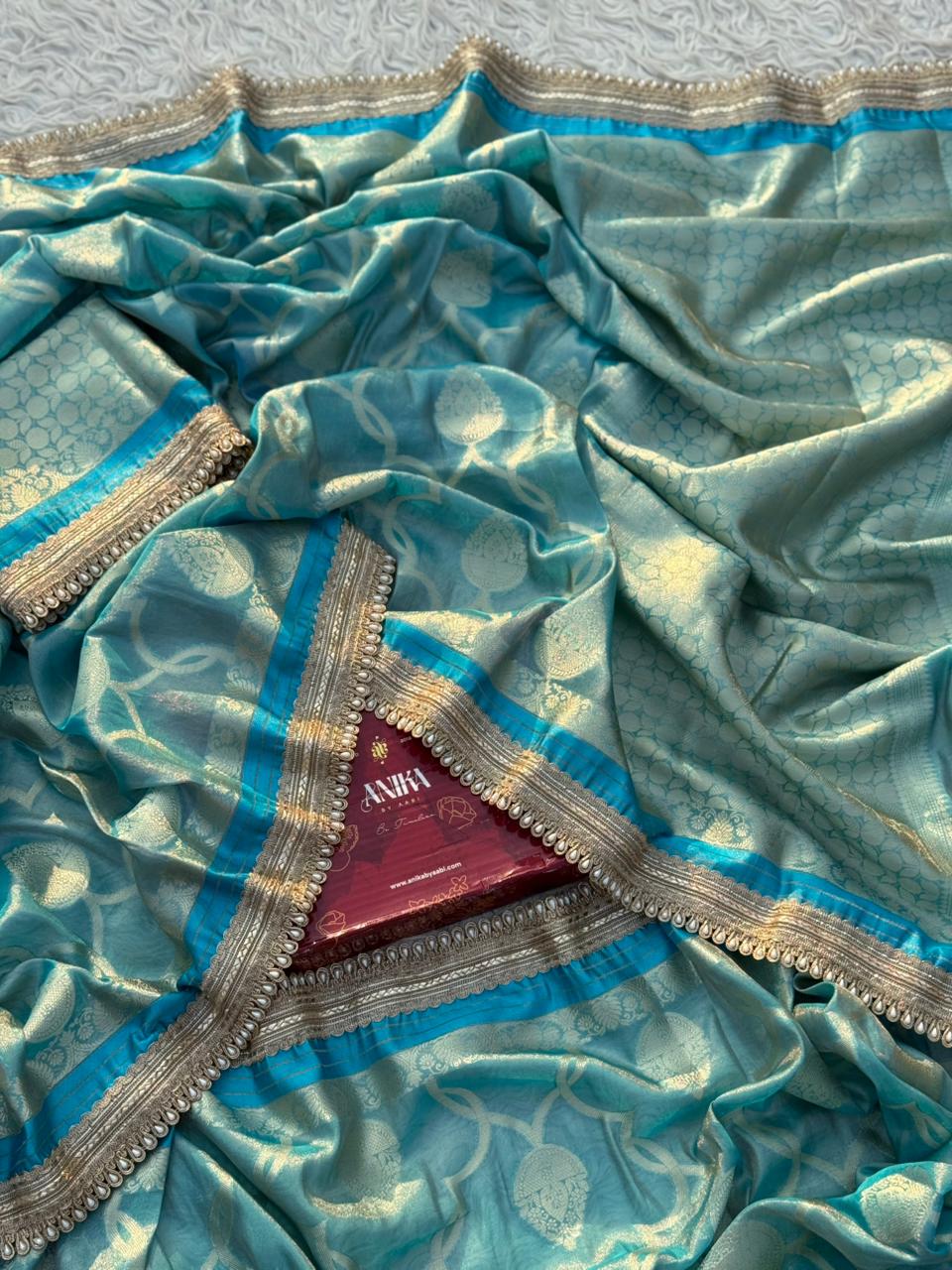 Anika's Tissue Motif saree - Blue