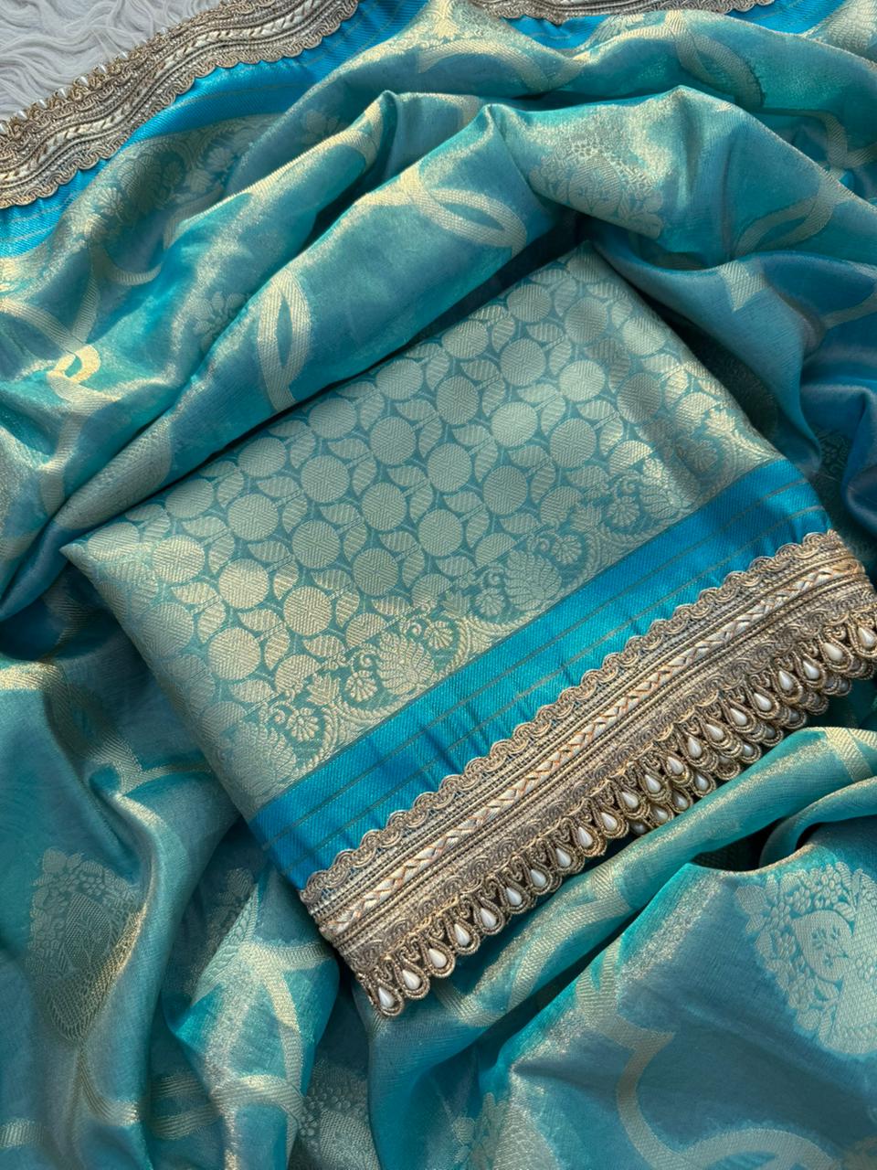Anika's Tissue Motif saree - Blue