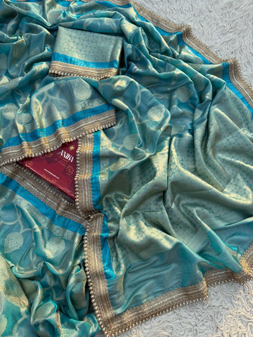Anika's Tissue Motif saree - Blue