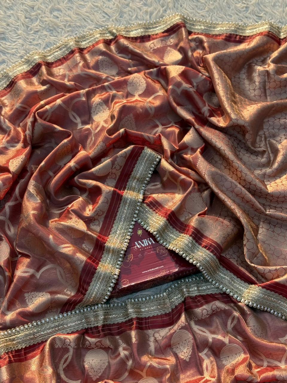 Anika's Tissue motif saree - Coffee Brown