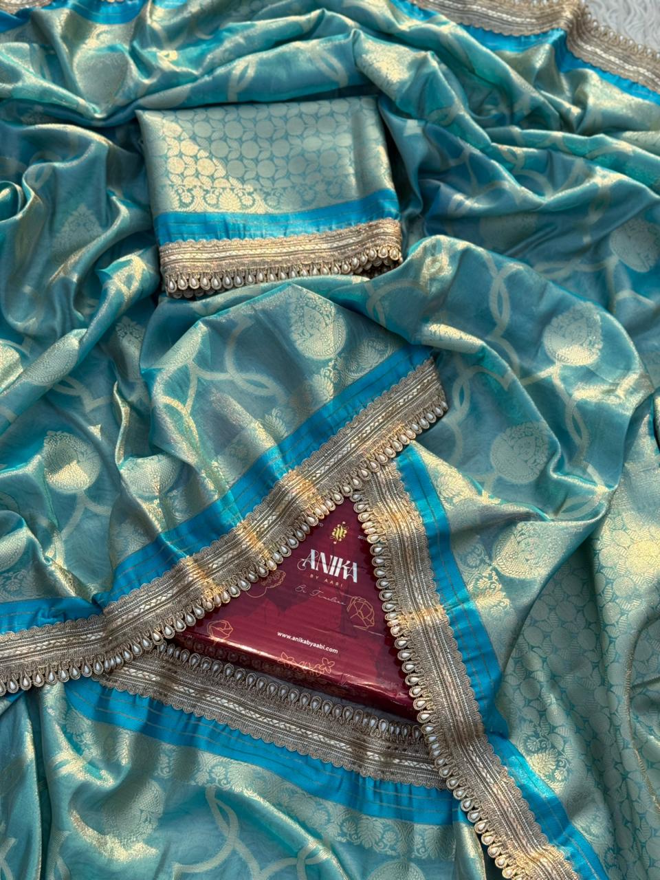 Anika's Tissue Motif saree - Blue