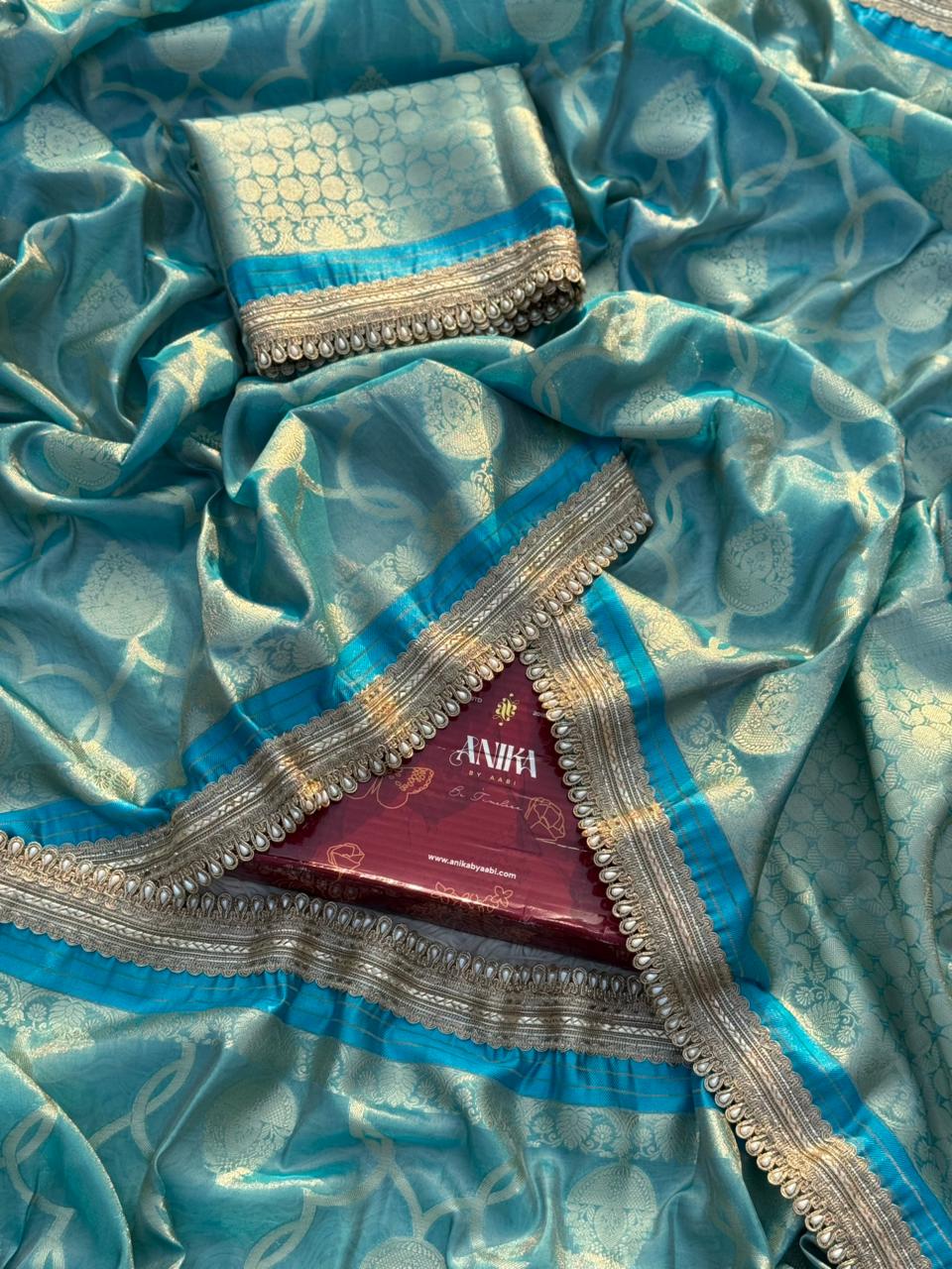 Anika's Tissue Motif saree - Blue