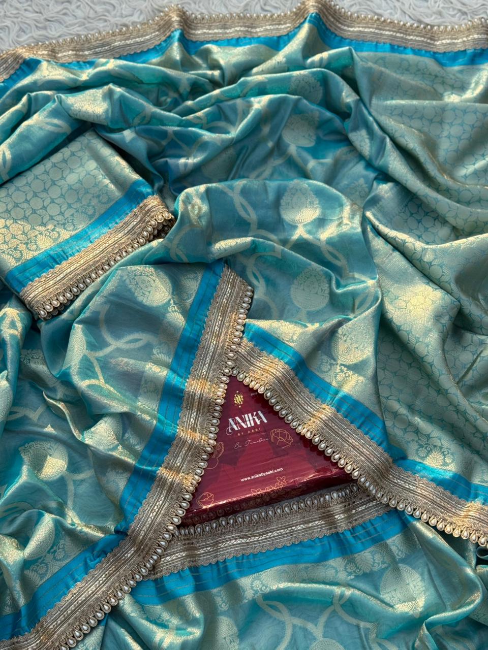 Anika's Tissue Motif saree - Blue
