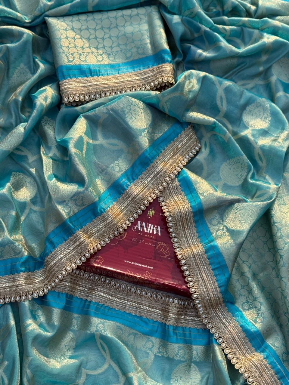 Anika's Tissue Motif saree - Blue